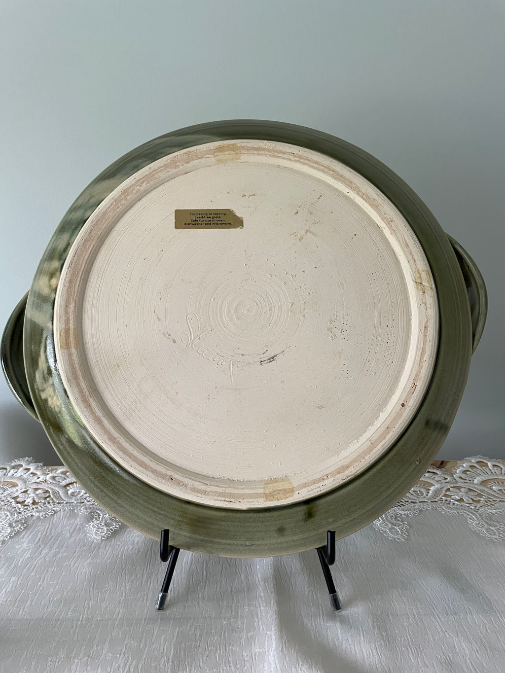 Olive green ceramic tray with sculpted handles