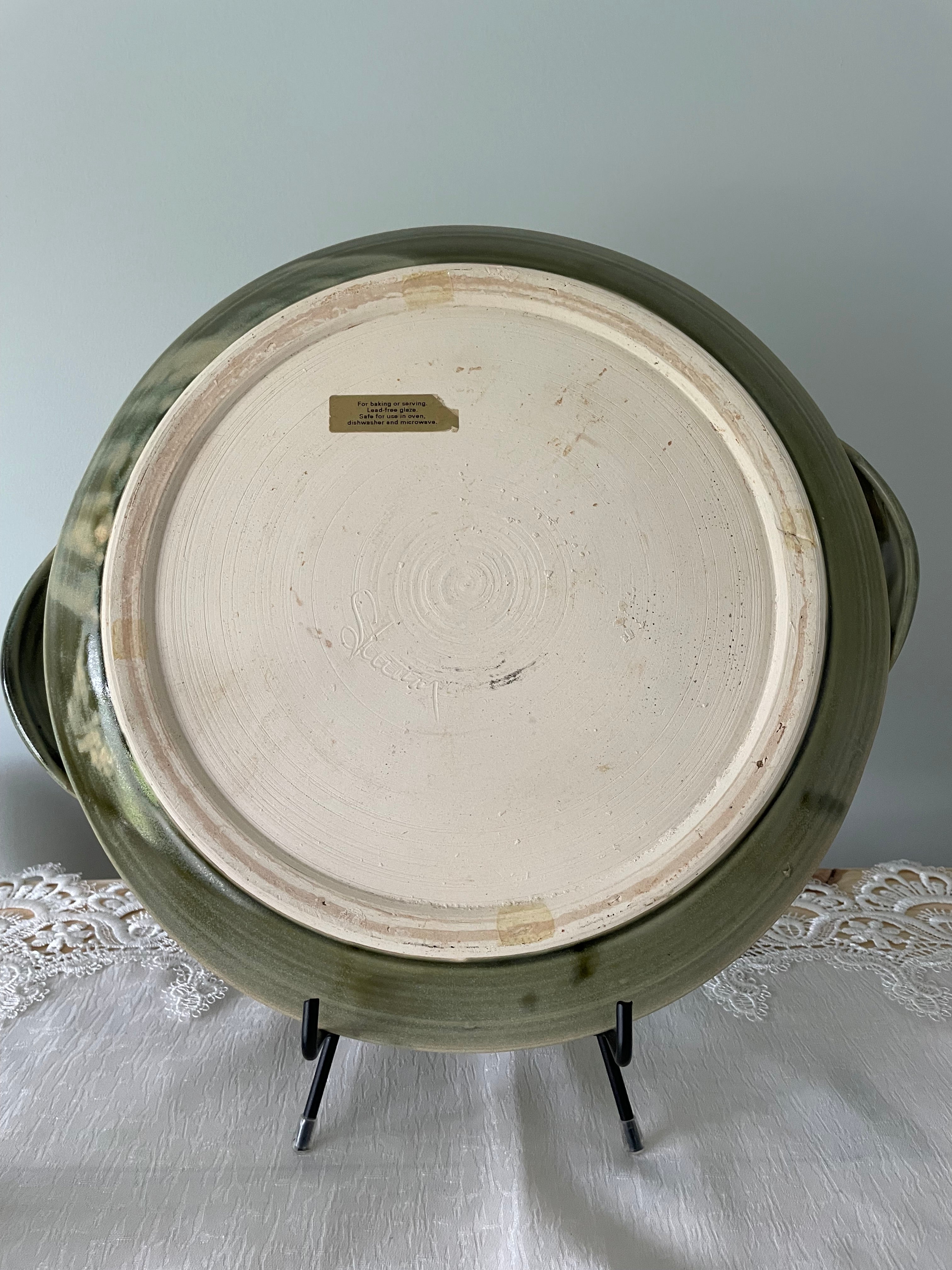 Olive green ceramic tray with sculpted handles