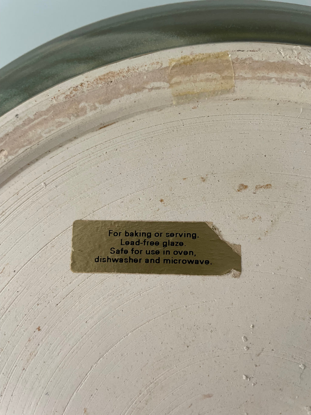 Olive green ceramic tray with sculpted handles