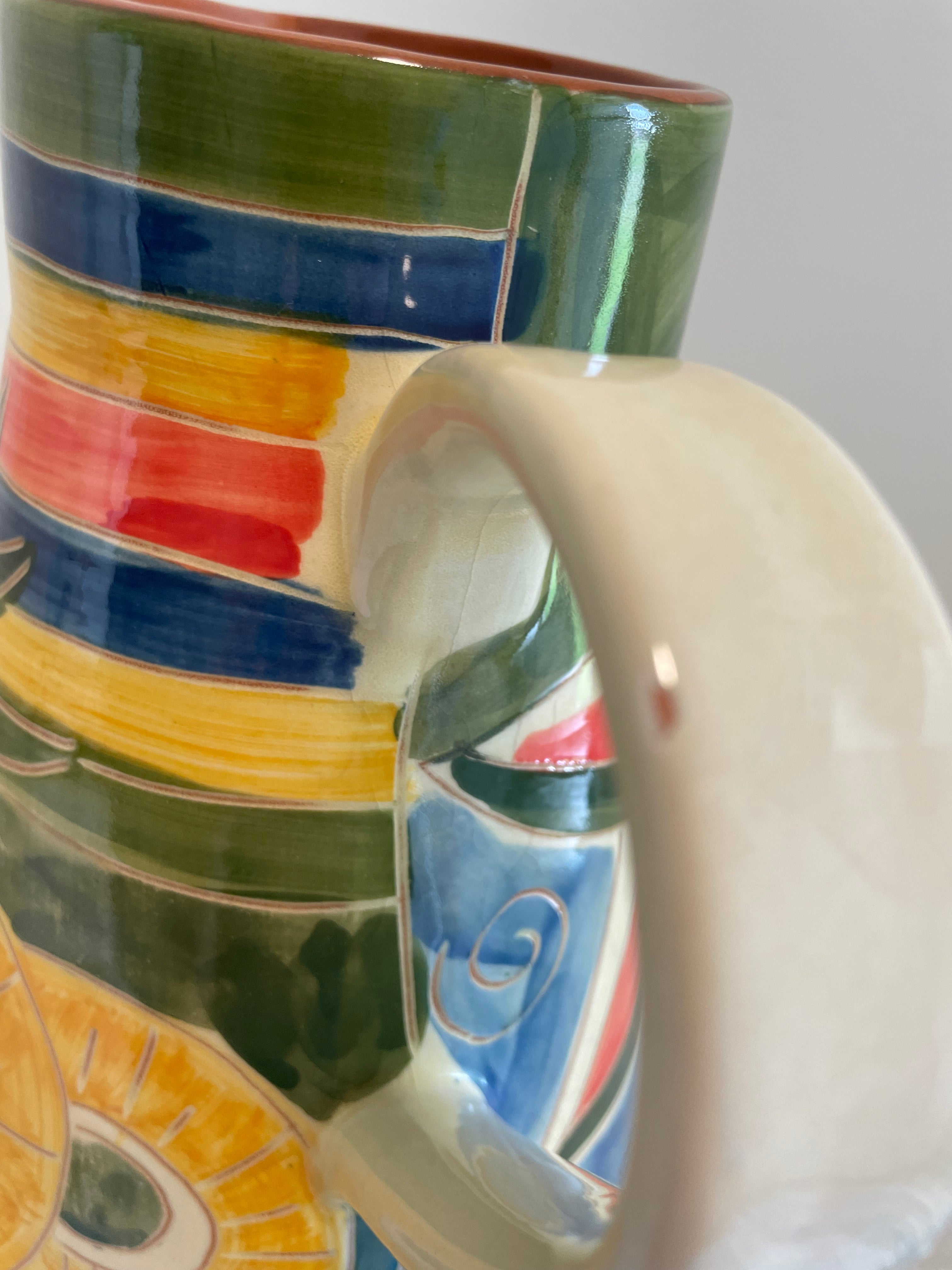 Vibrant hand-decorated Portugal pottery pitcher