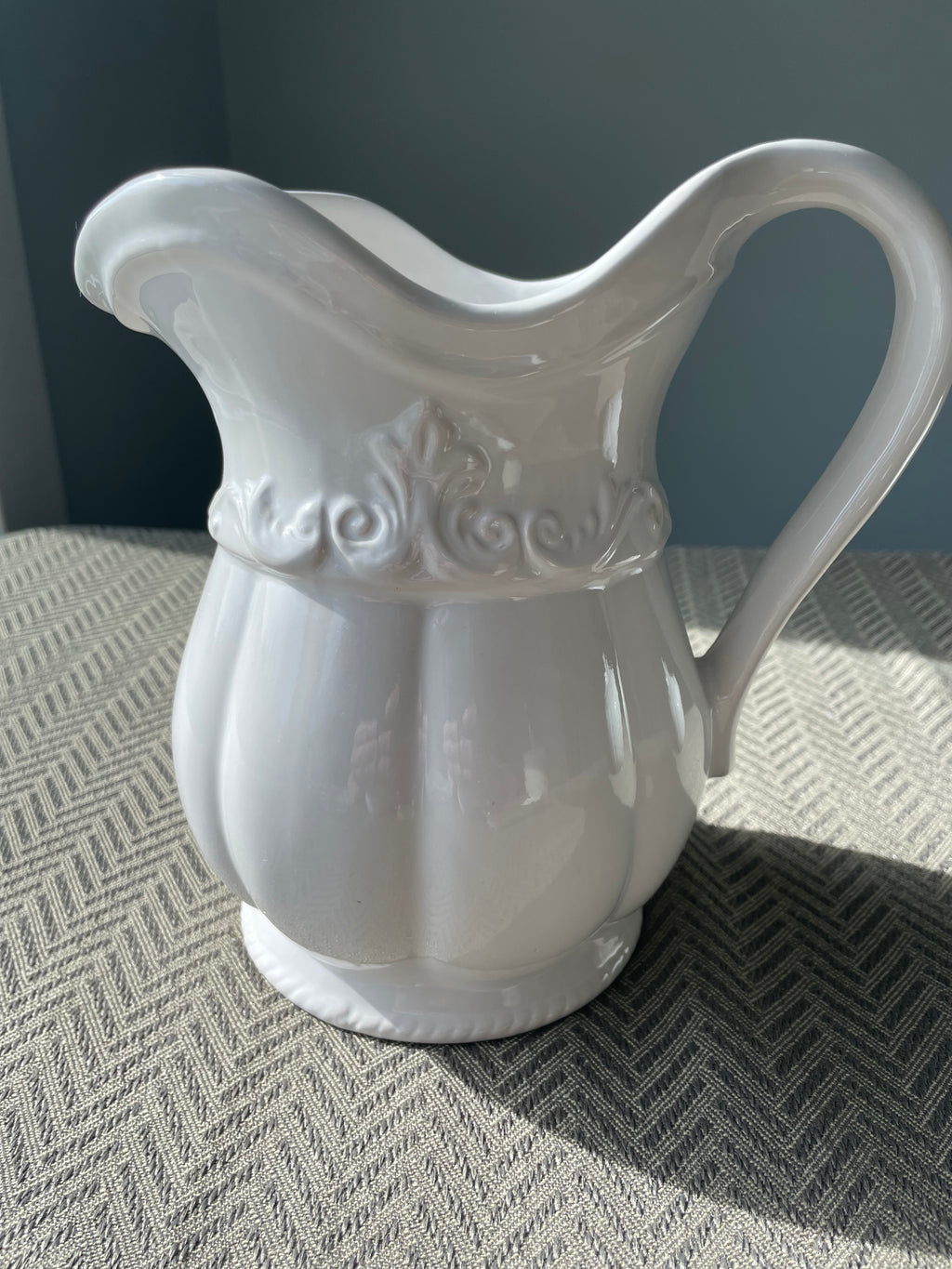Pfaltzgraff Filigree pattern stoneware pitcher with embossed scrolls