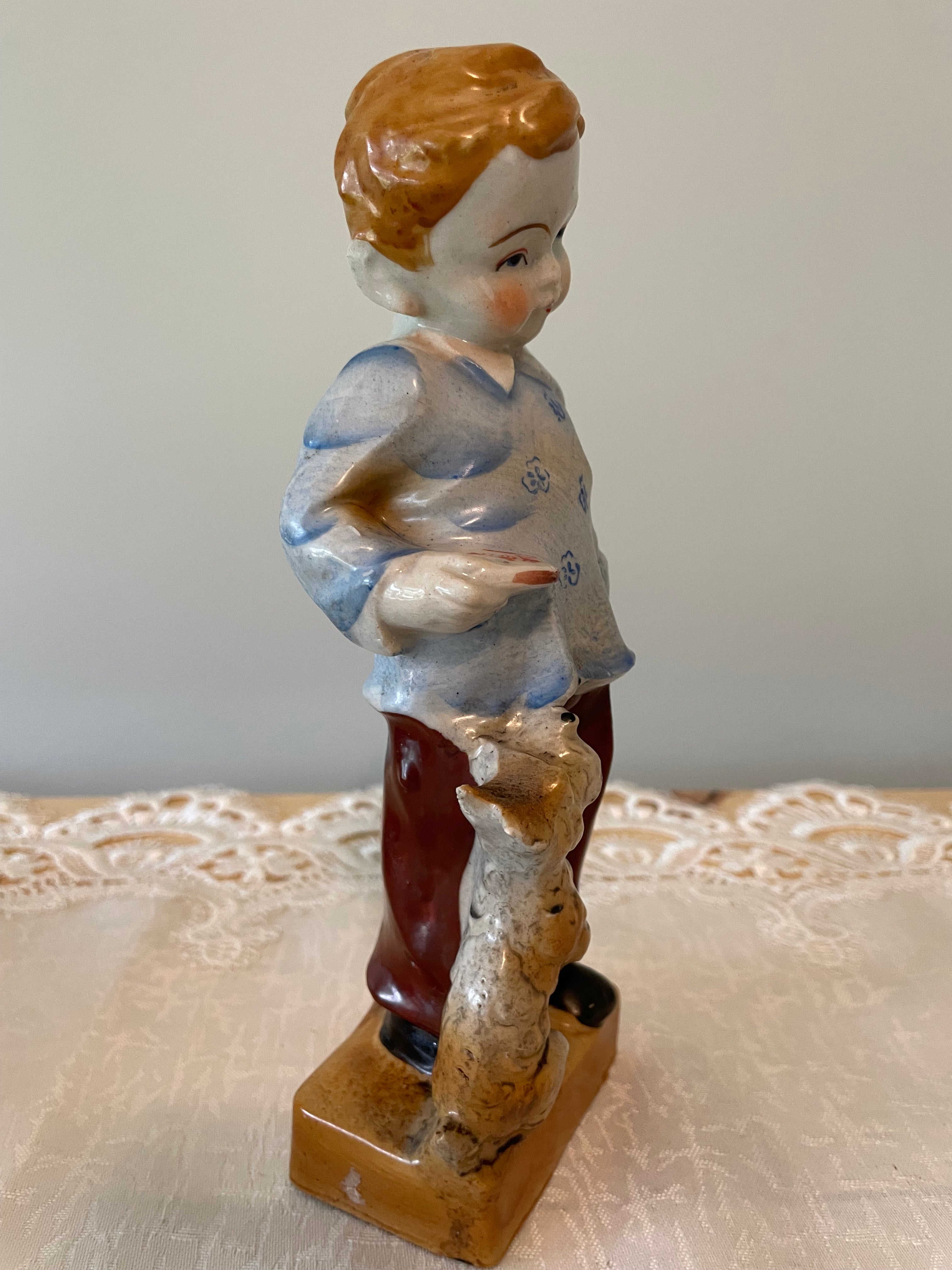 Vintage Japan hand painted boy and girl figurines