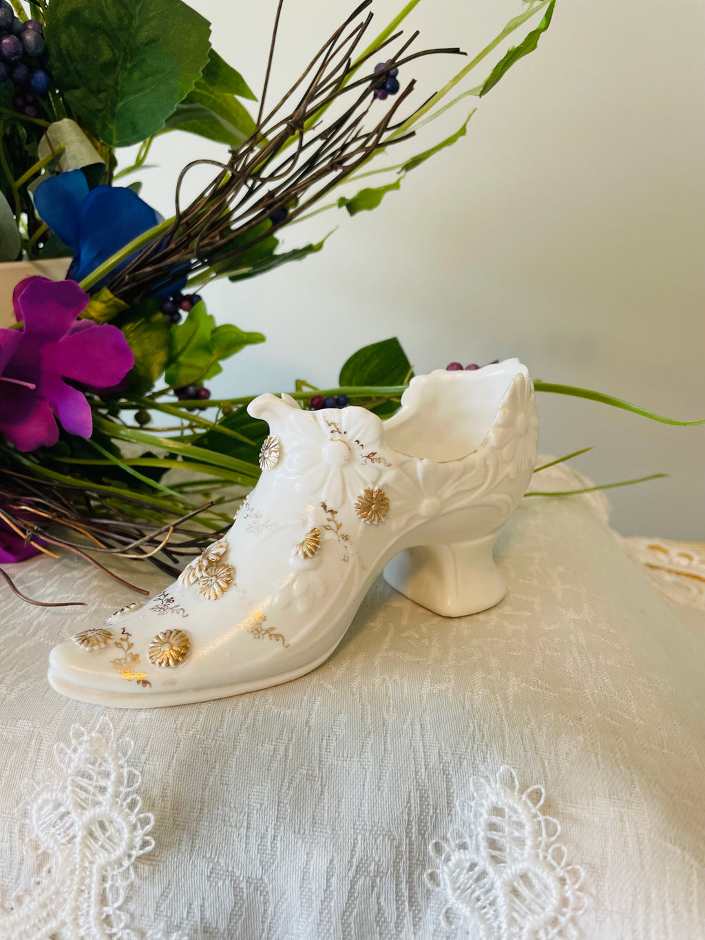 Victorian porcelain shoe with embossed floral and gilded accents