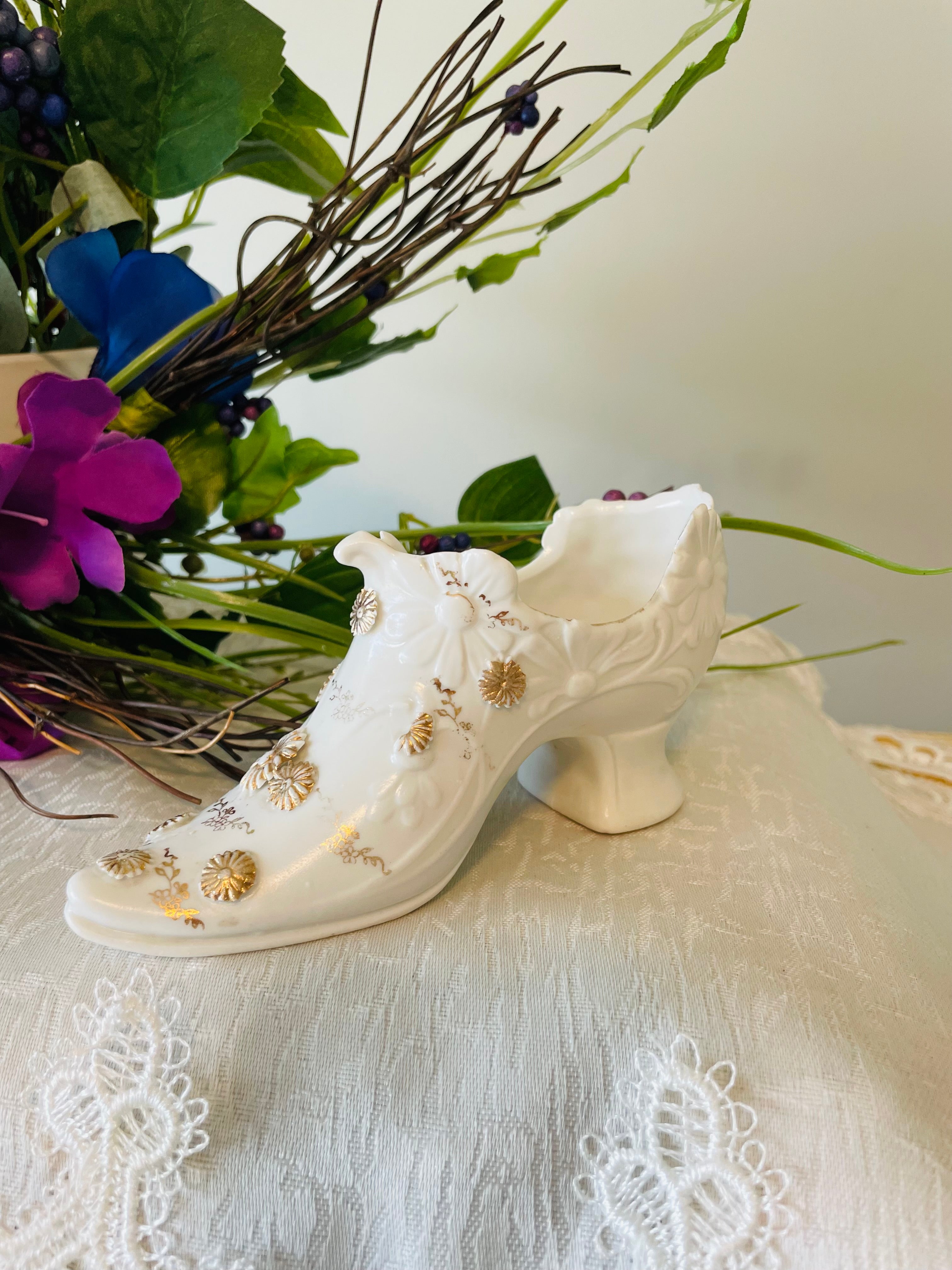 Victorian porcelain shoe with embossed floral and gilded accents
