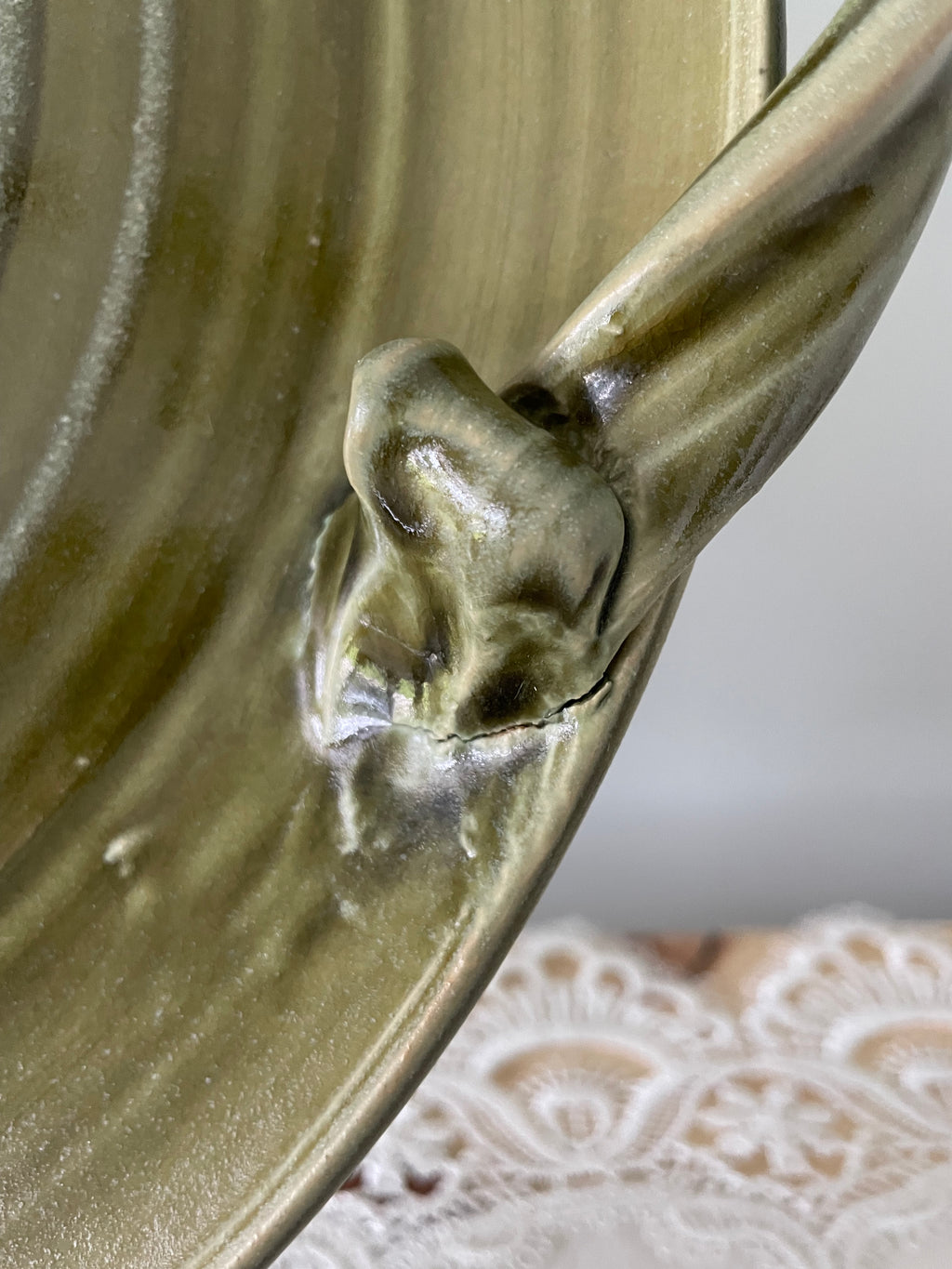 Olive green ceramic tray with sculpted handles