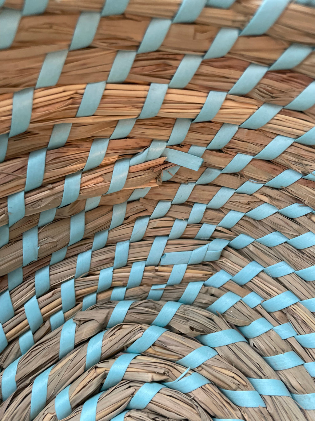 Wicker woven basket with soft blues