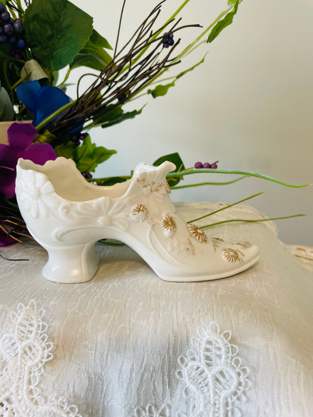 Victorian porcelain shoe with embossed floral and gilded accents
