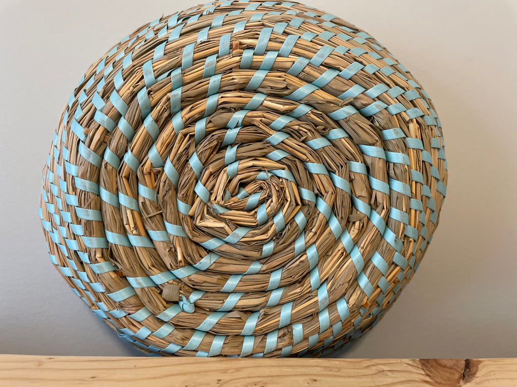 Wicker woven basket with soft blues