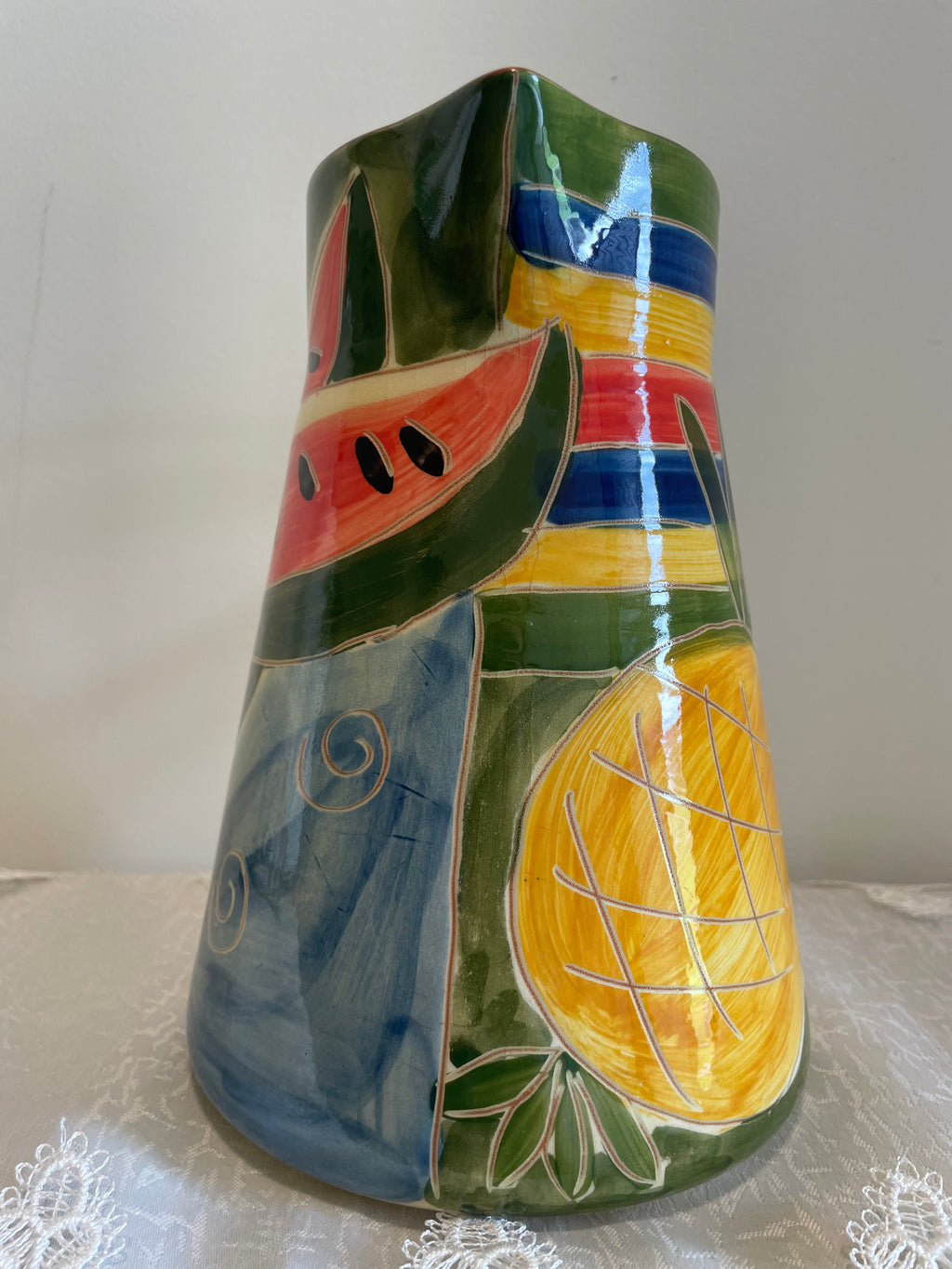 Vibrant hand-decorated Portugal pottery pitcher