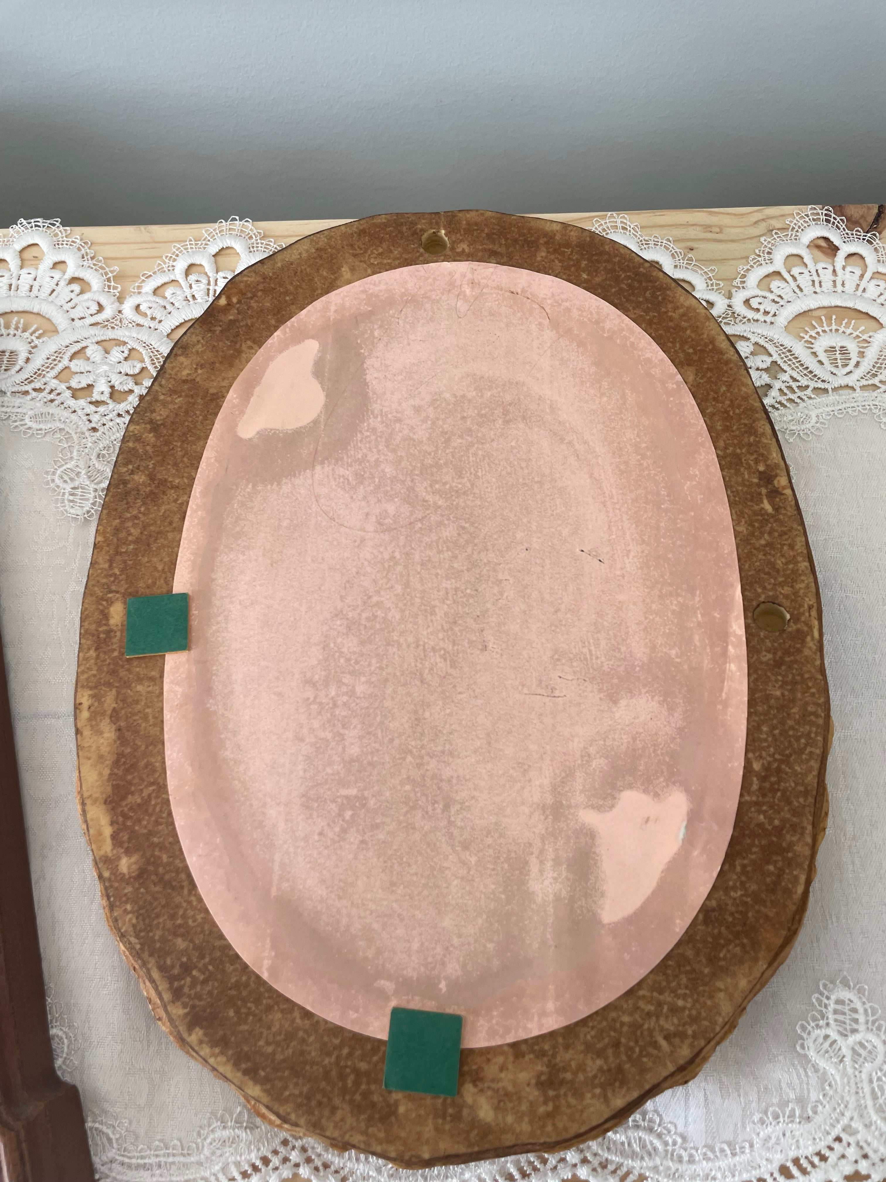 Vintage Rattan framed oval mirror
