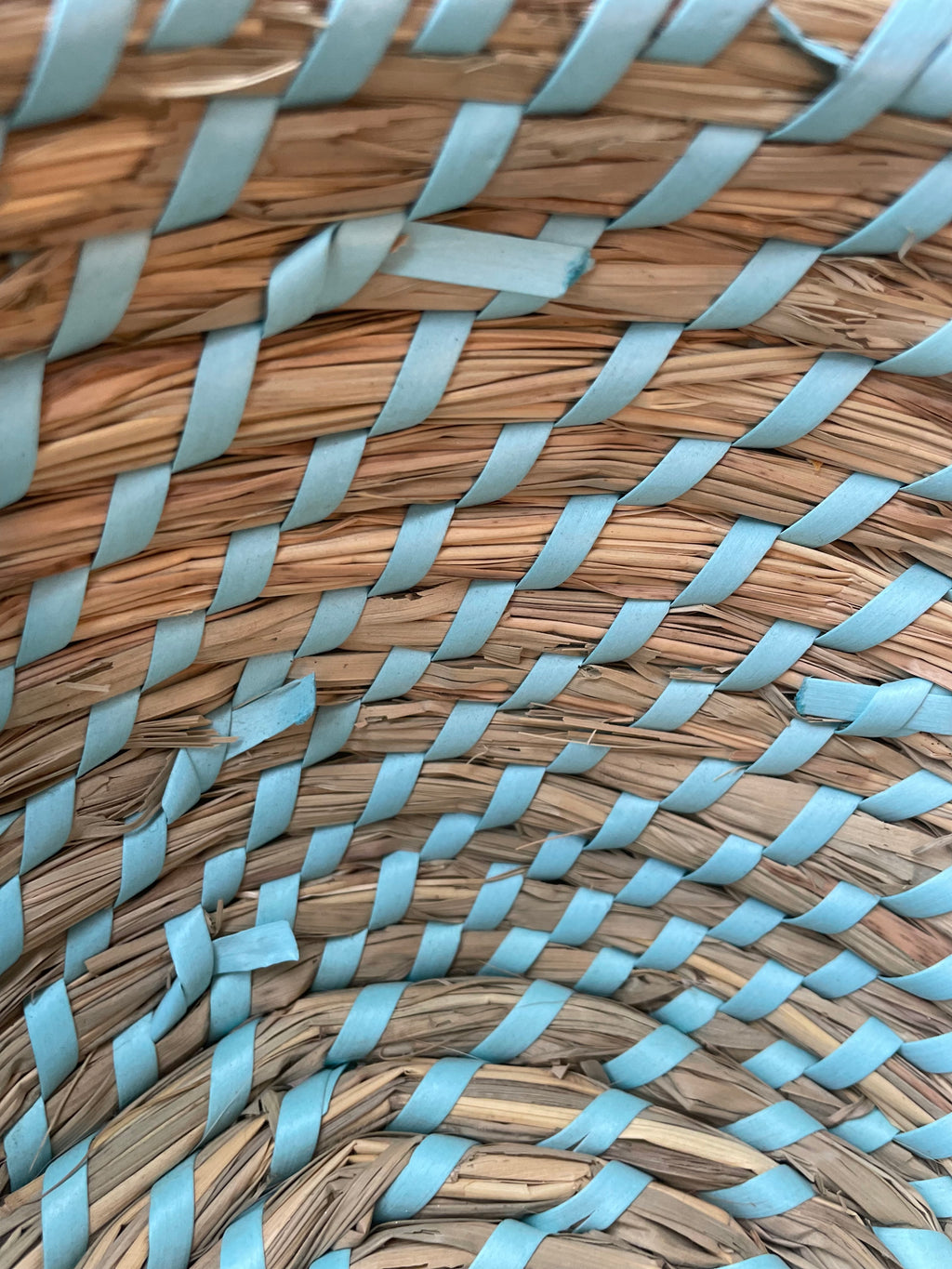 Wicker woven basket with soft blues