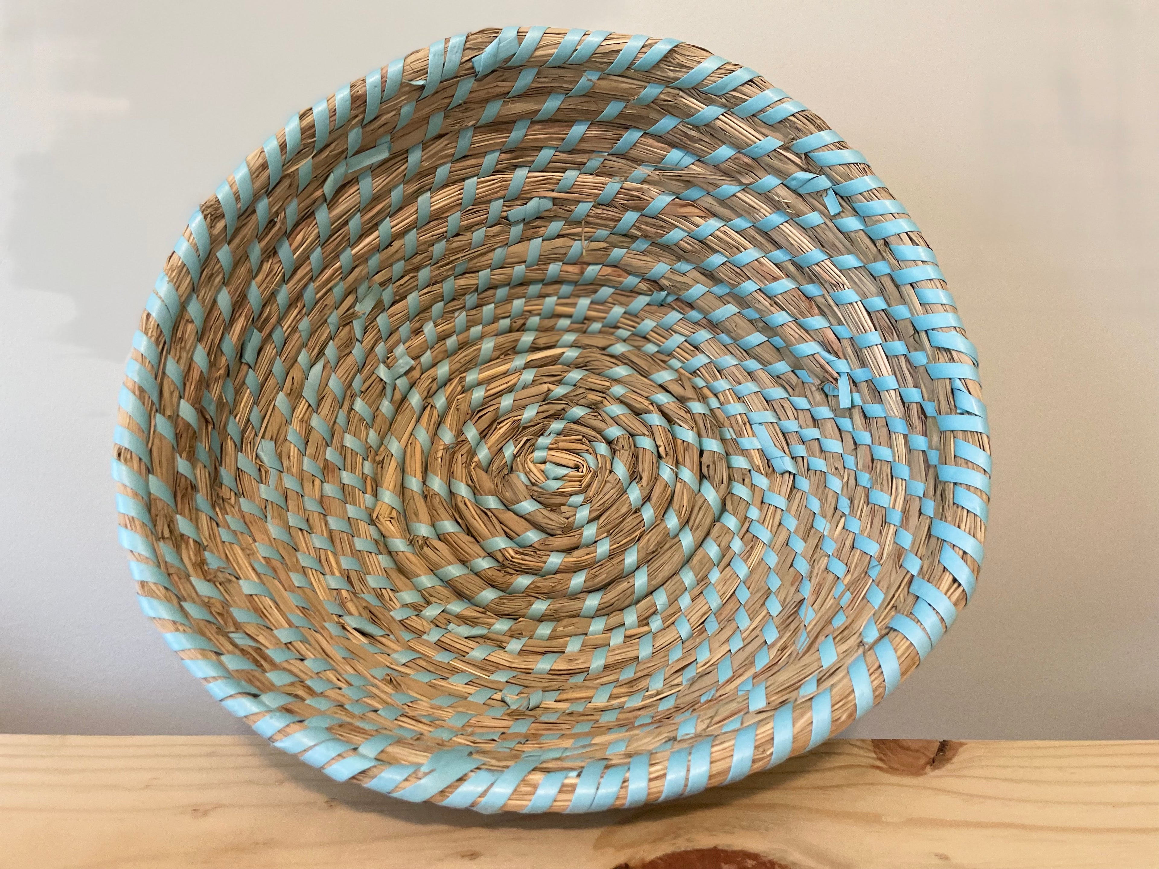 Wicker woven basket with soft blues