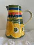 Vibrant hand-decorated Portugal pottery pitcher
