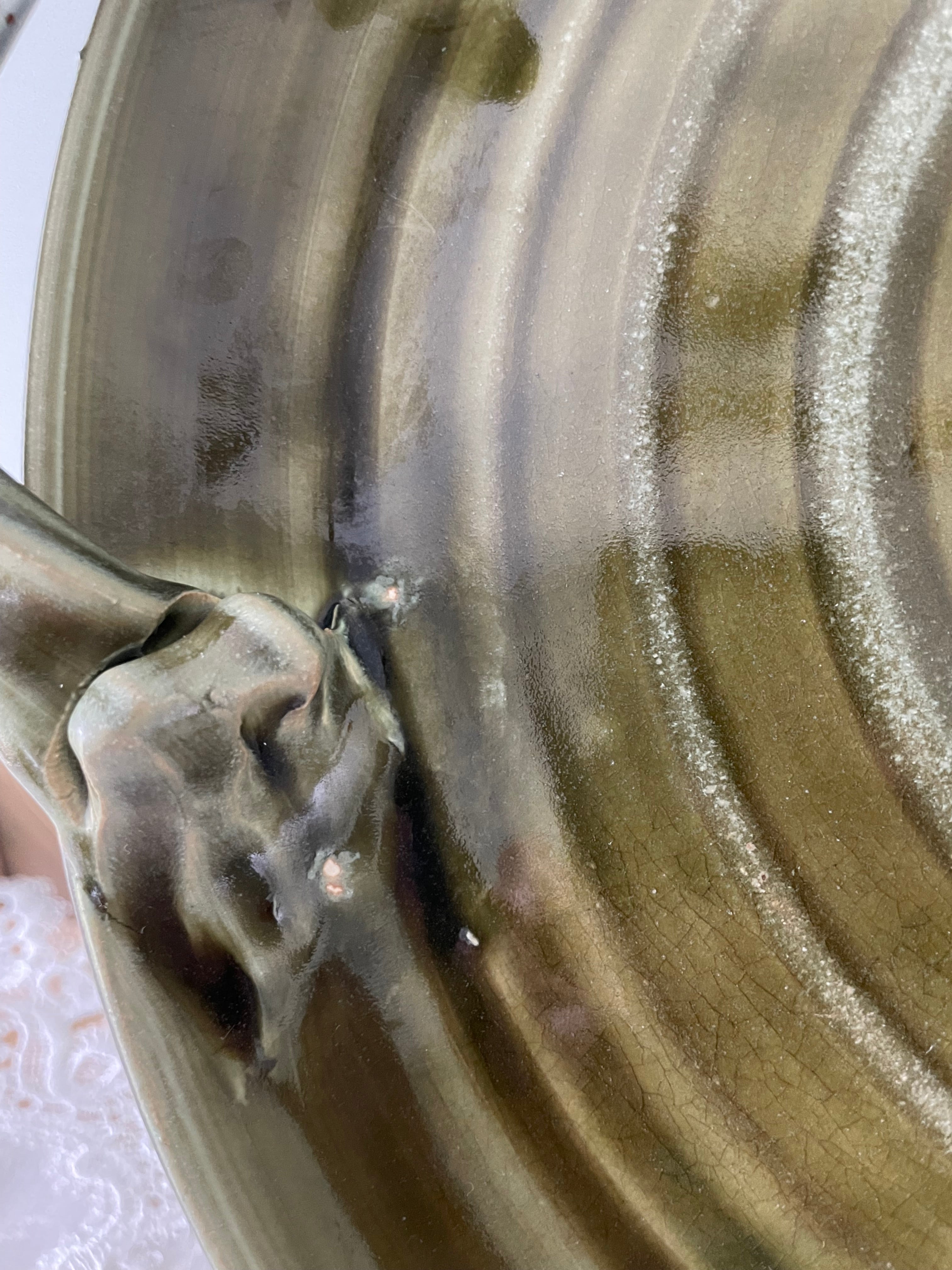Olive green ceramic tray with sculpted handles