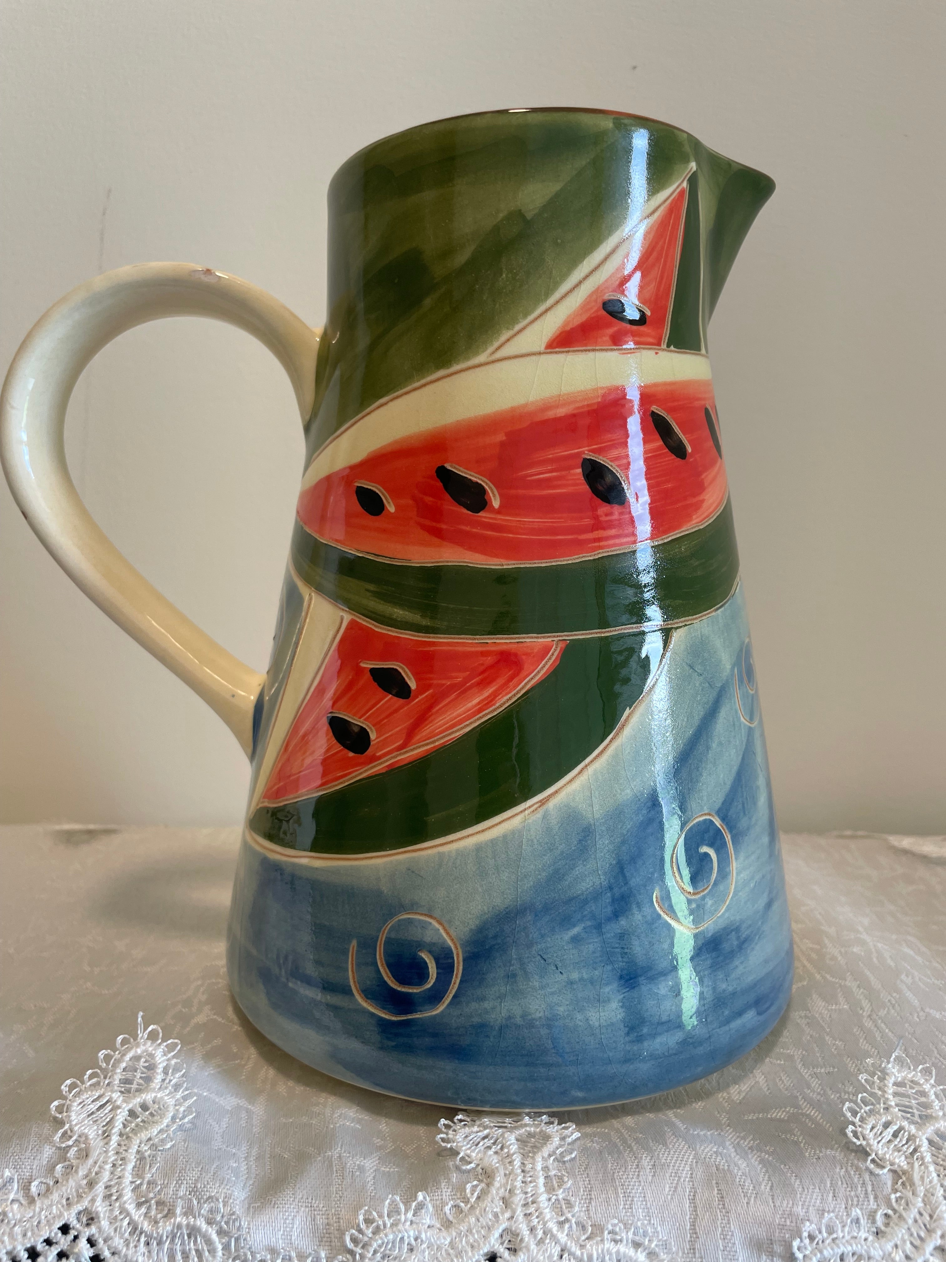 Vibrant hand-decorated Portugal pottery pitcher