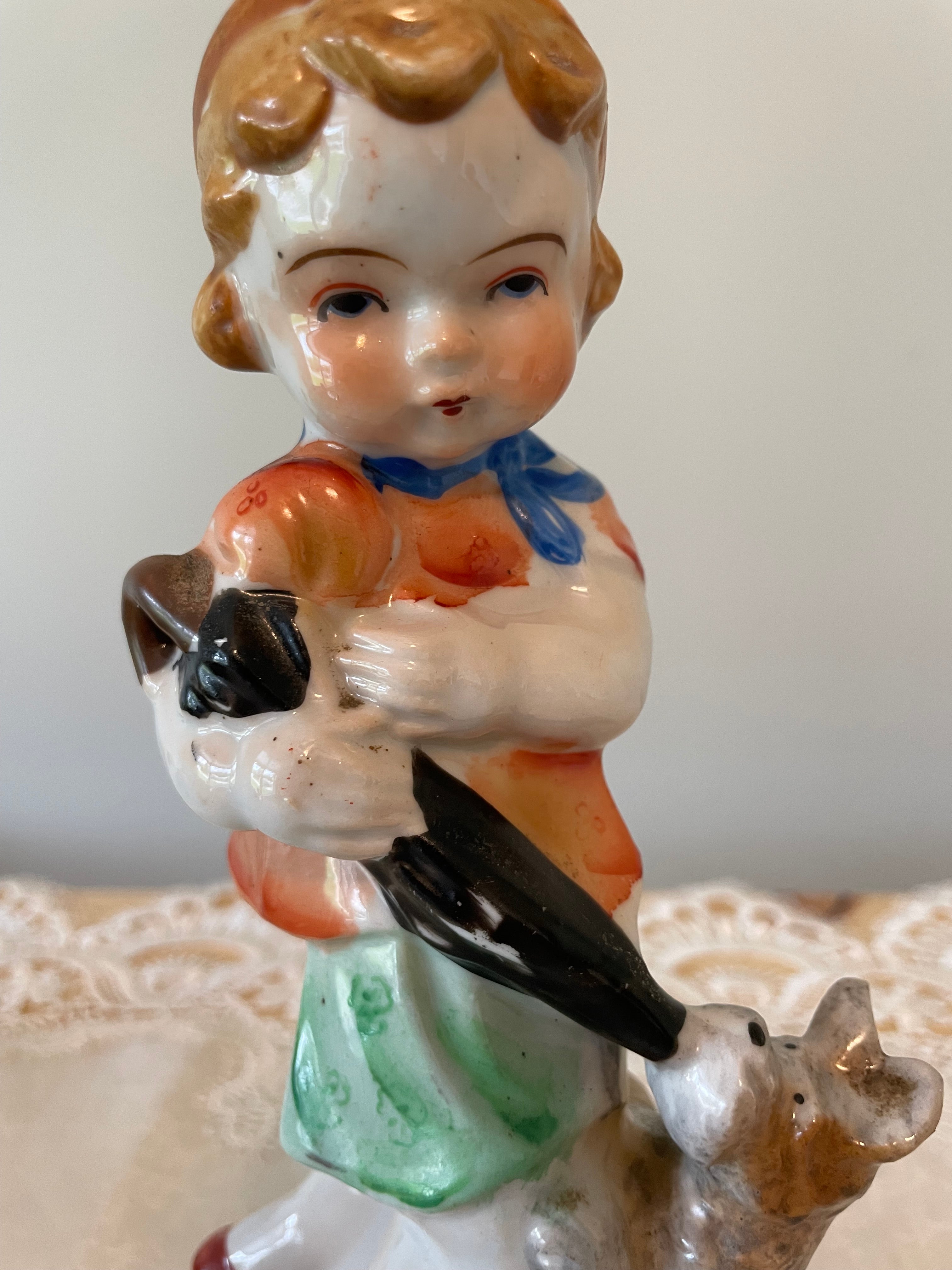 Vintage Japan hand painted boy and girl figurines