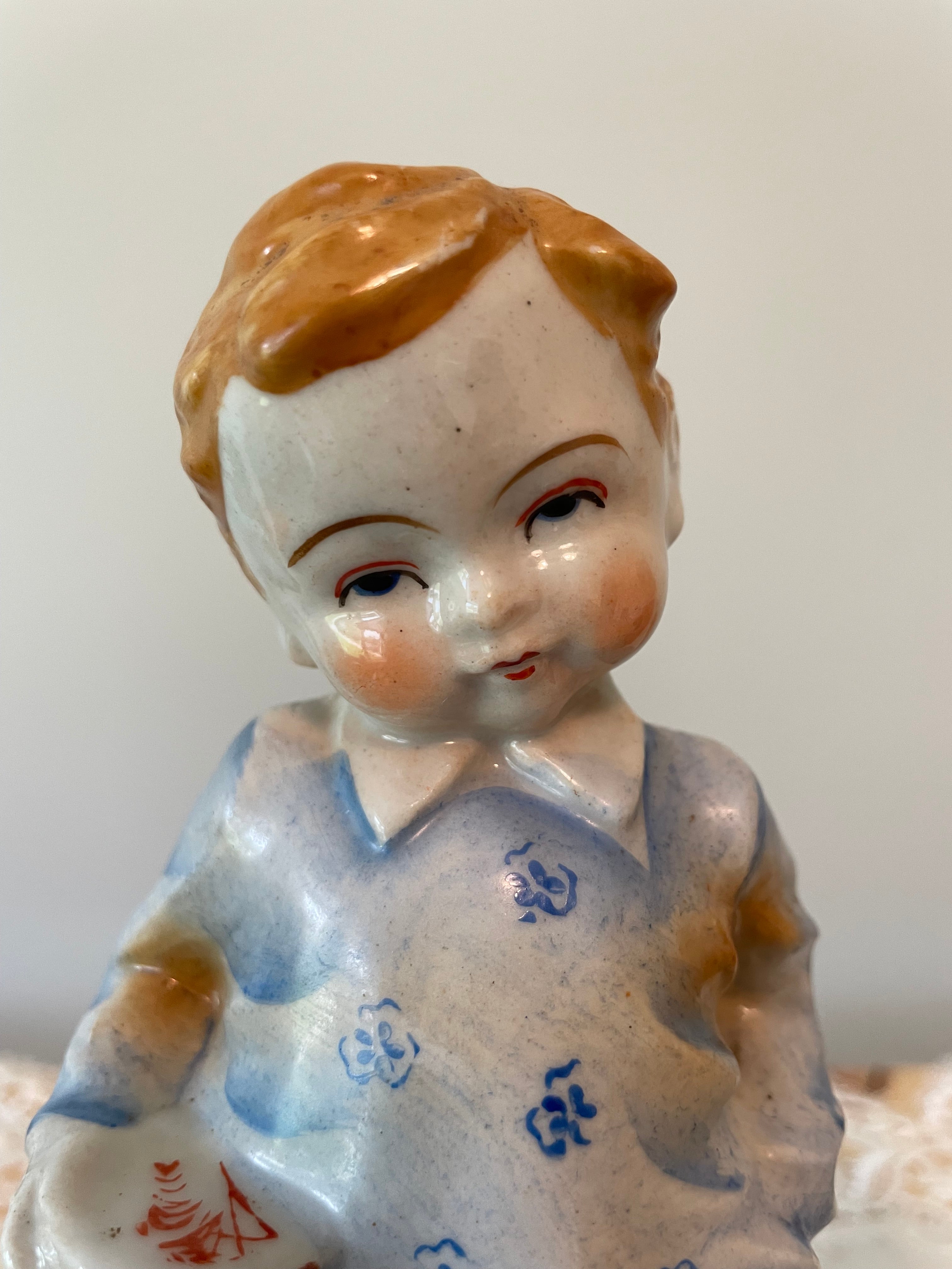 Vintage Japan hand painted boy and girl figurines