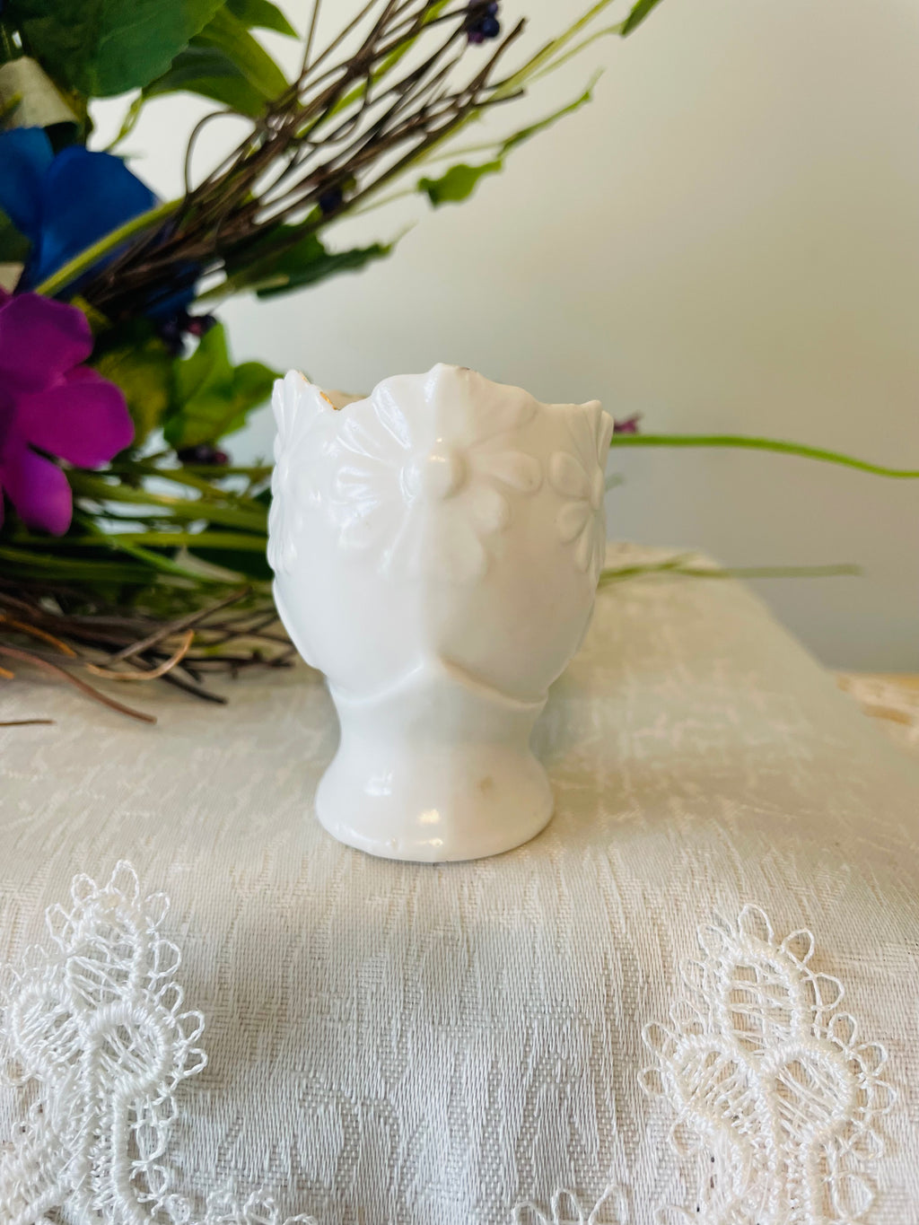 Victorian porcelain shoe with embossed floral and gilded accents