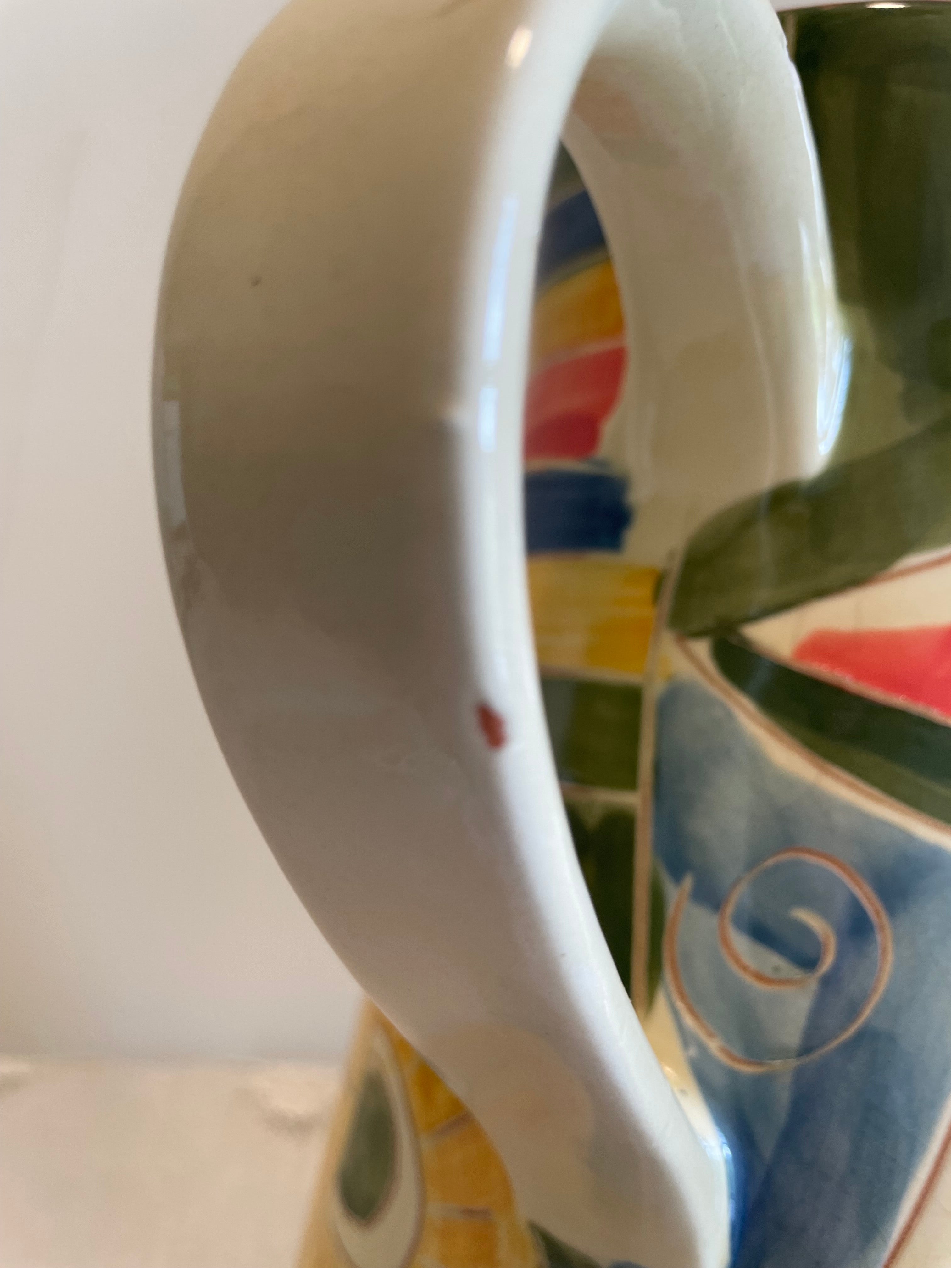 Vibrant hand-decorated Portugal pottery pitcher