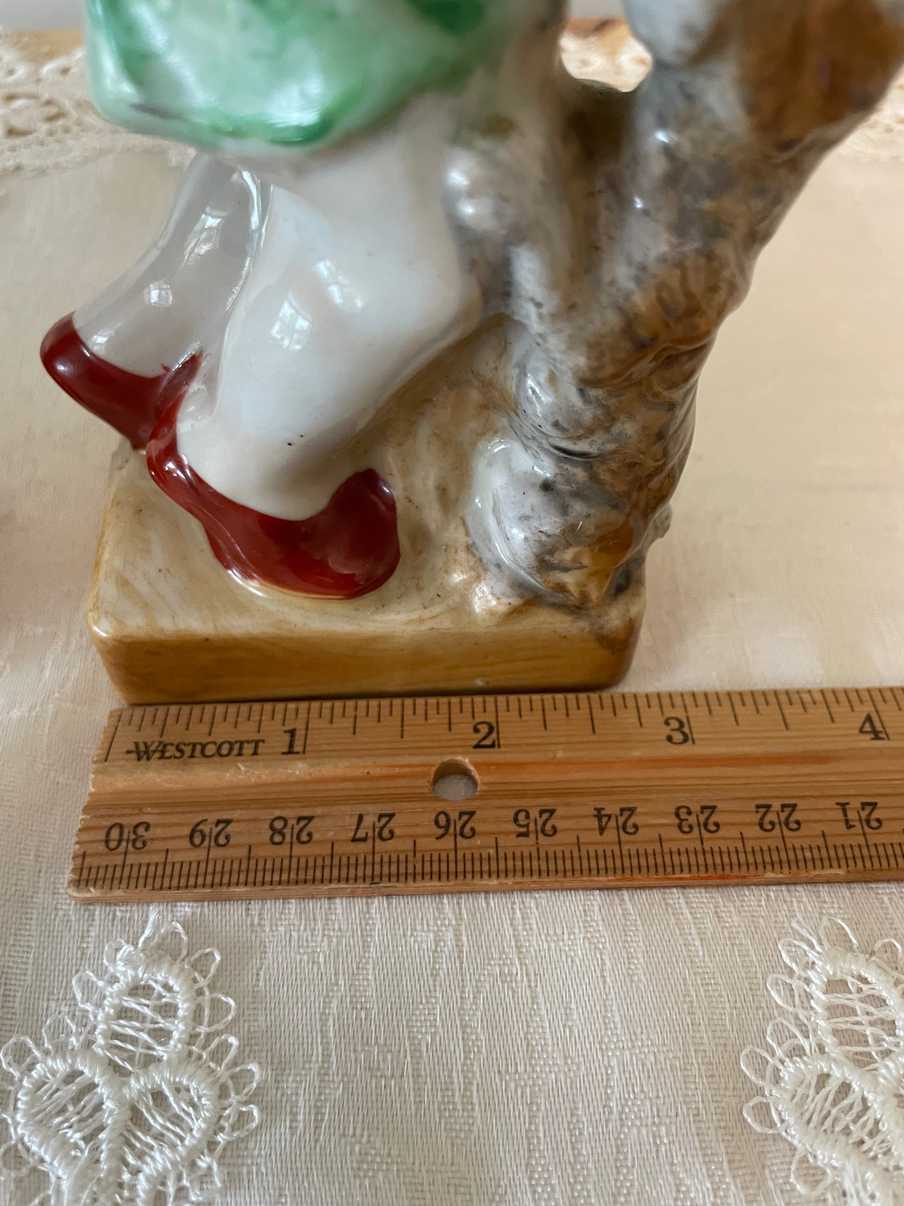 Vintage Japan hand painted boy and girl figurines
