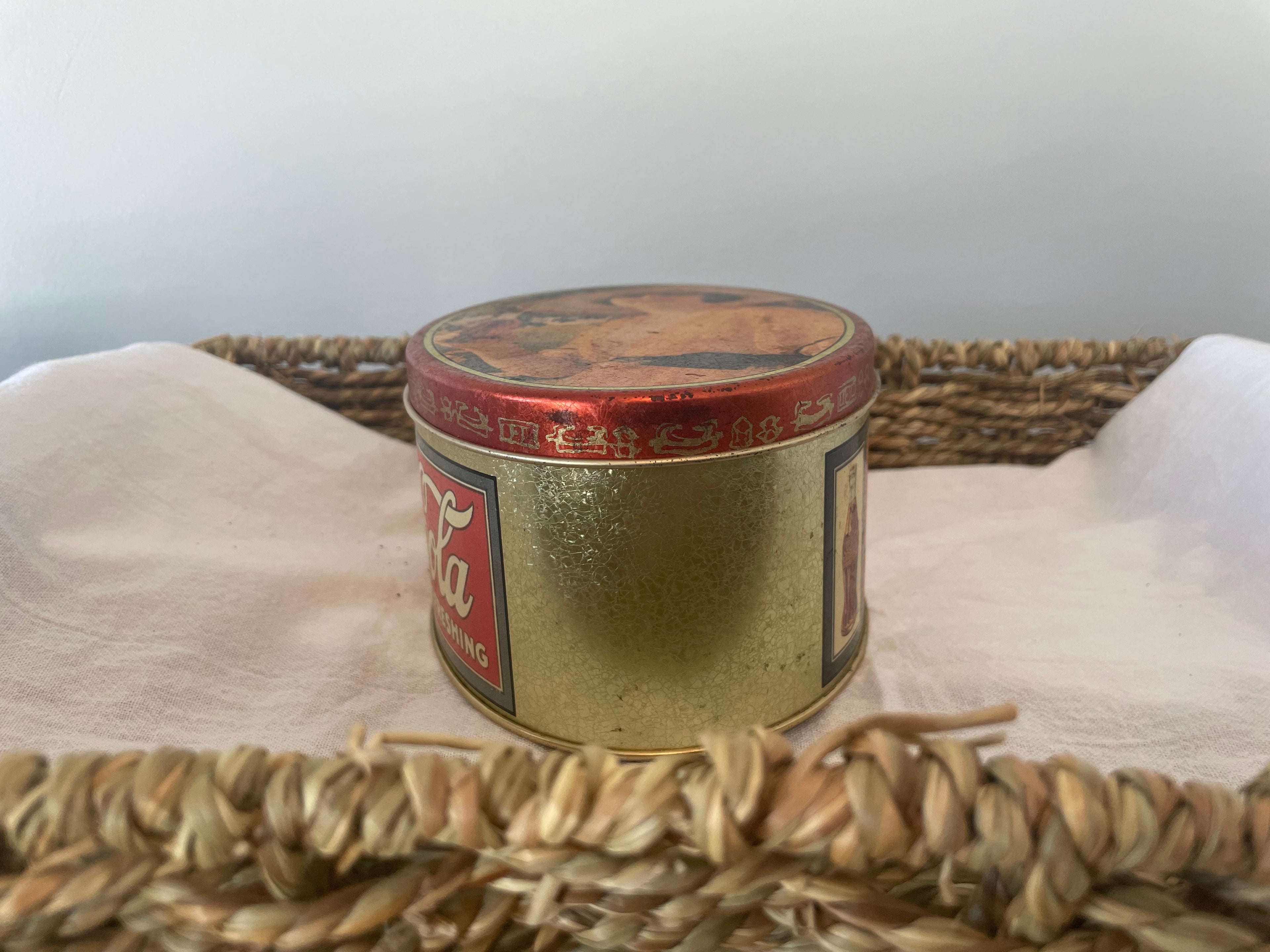 Mid 1990’s Coca-Cola oval gold tin