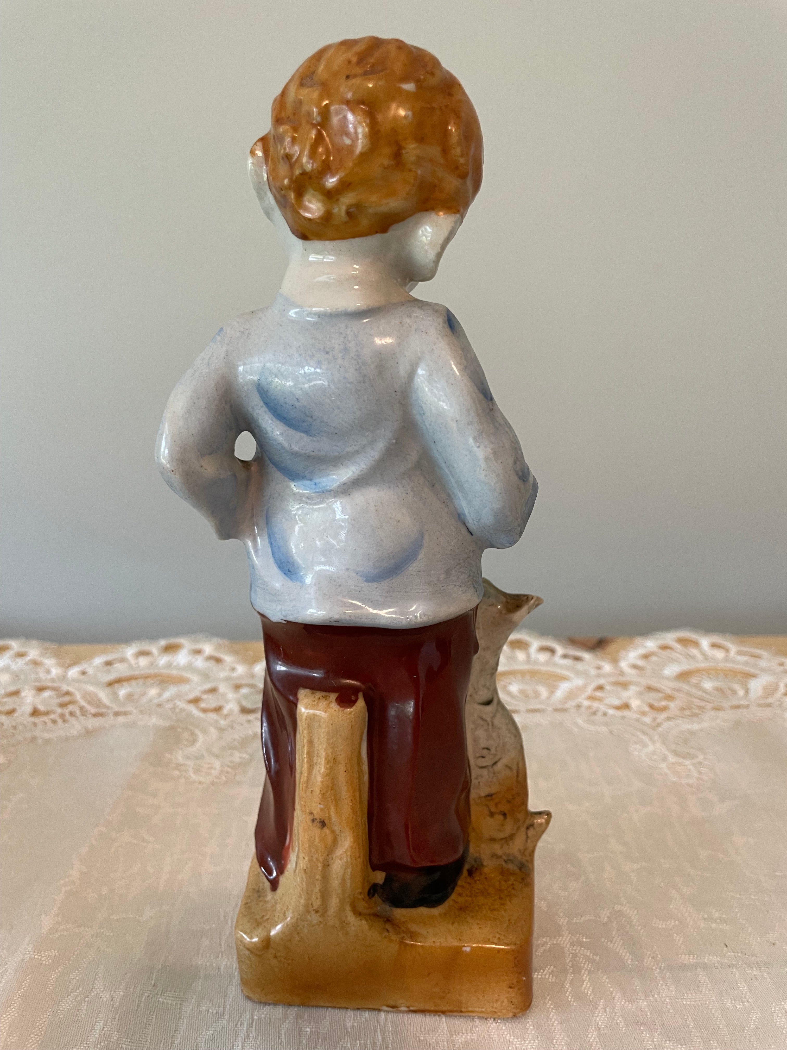 Vintage Japan hand painted boy and girl figurines