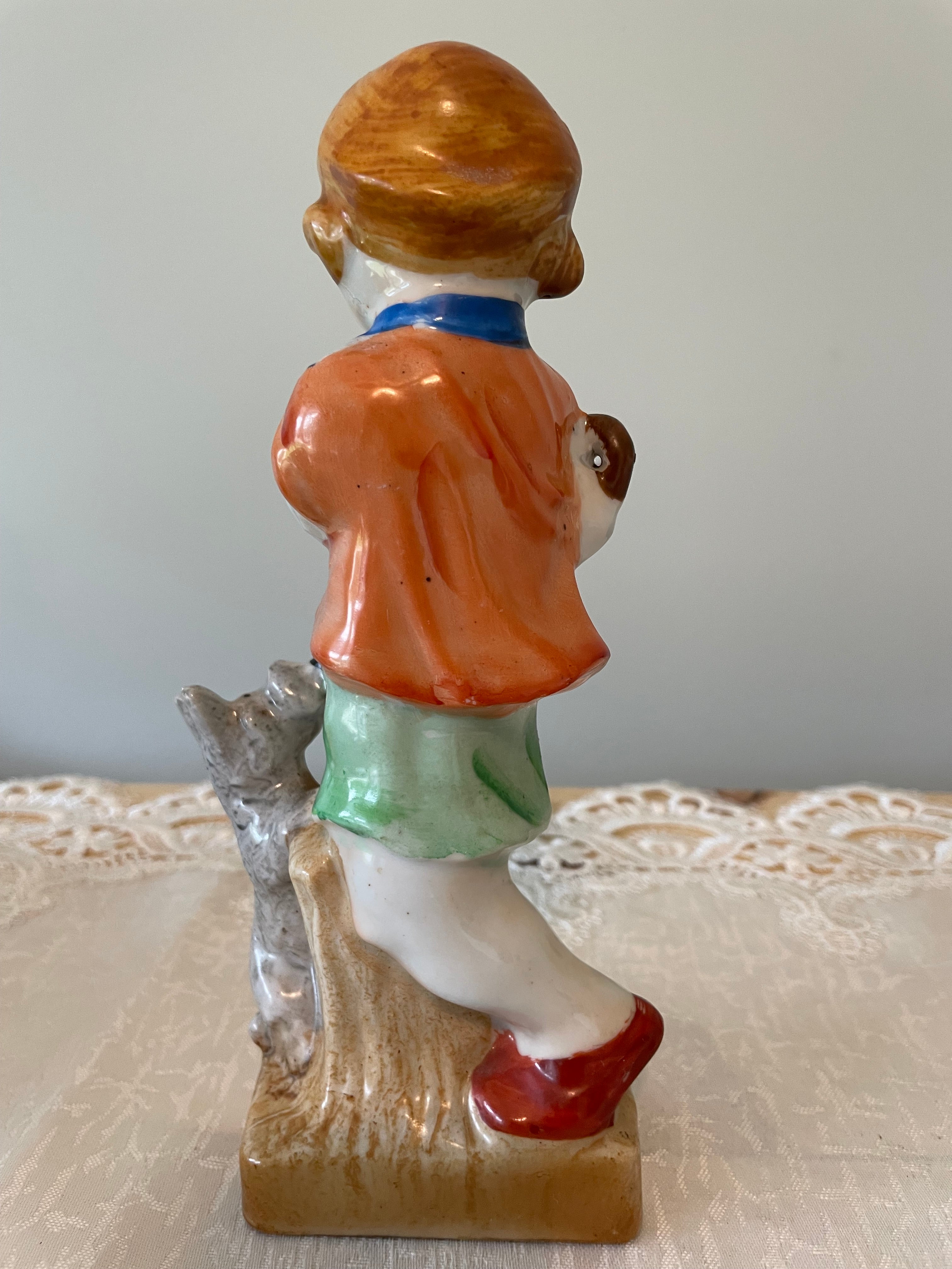 Vintage Japan hand painted boy and girl figurines