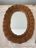 Vintage Rattan framed oval mirror