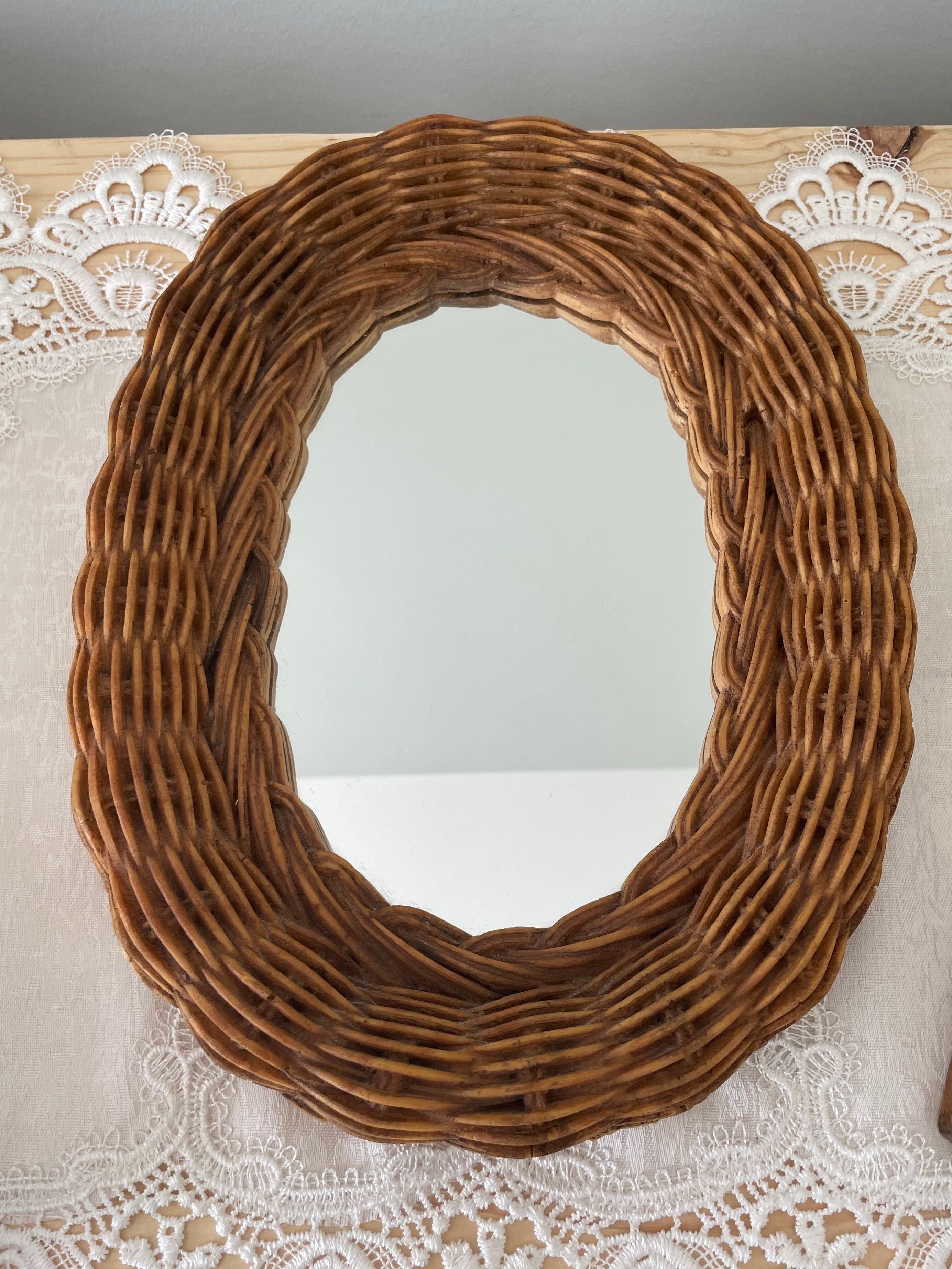 Vintage Rattan framed oval mirror