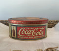 Mid 1990’s Coca-Cola oval gold tin
