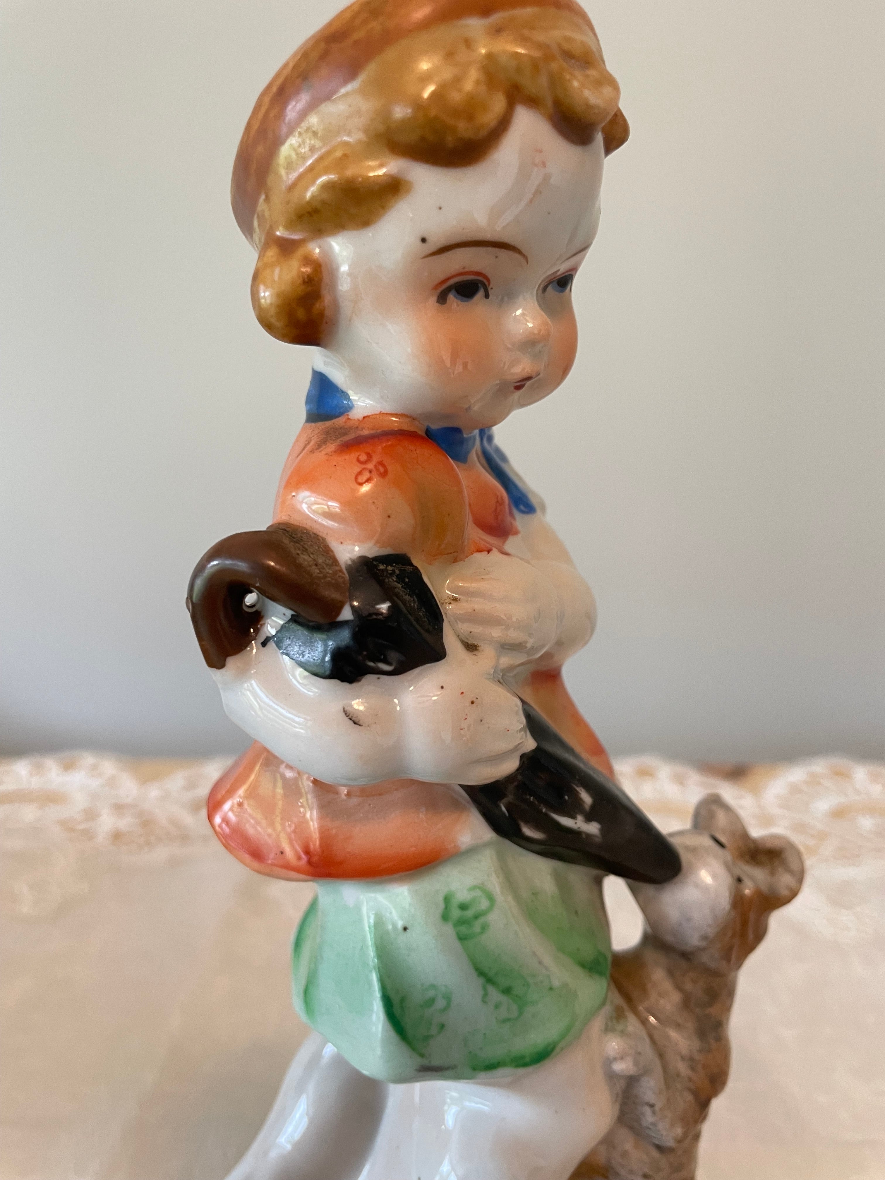 Vintage Japan hand painted boy and girl figurines