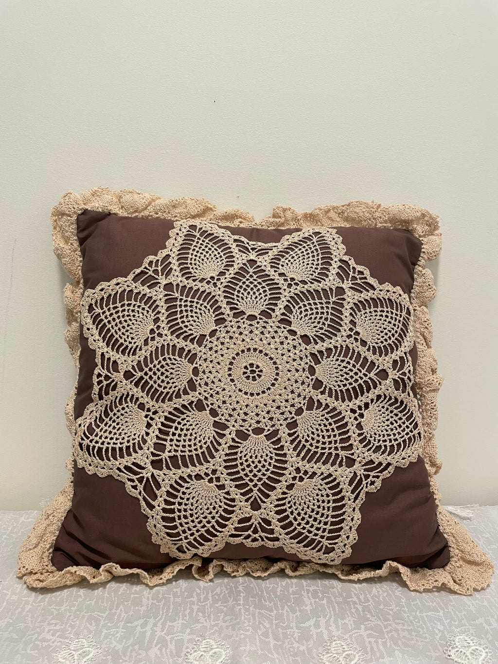 Decorative 12" square brown throw pillow