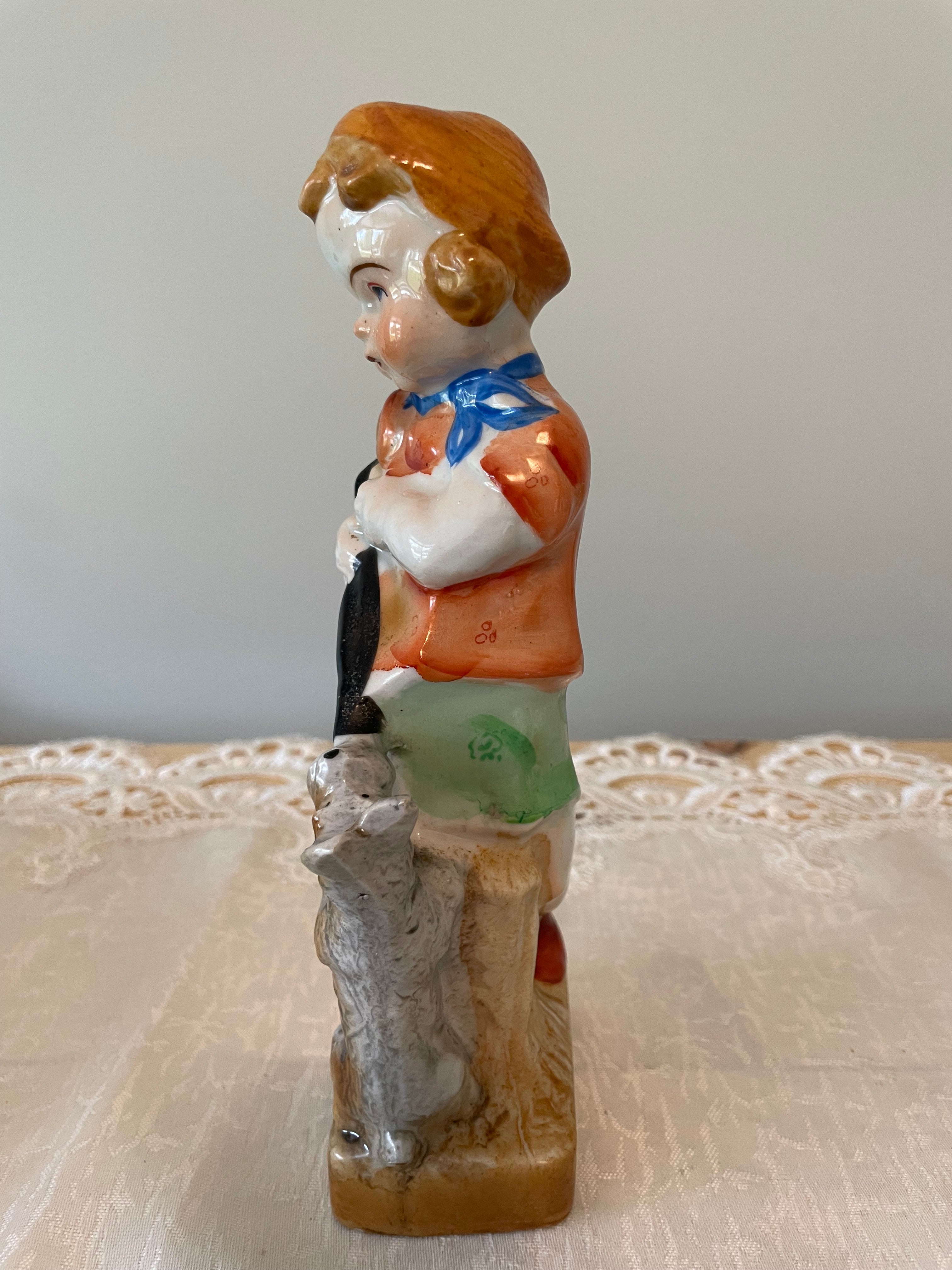Vintage Japan hand painted boy and girl figurines