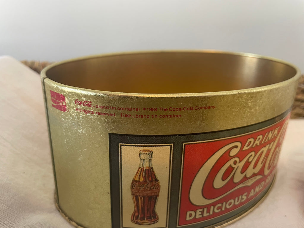 Mid 1990’s Coca-Cola oval gold tin