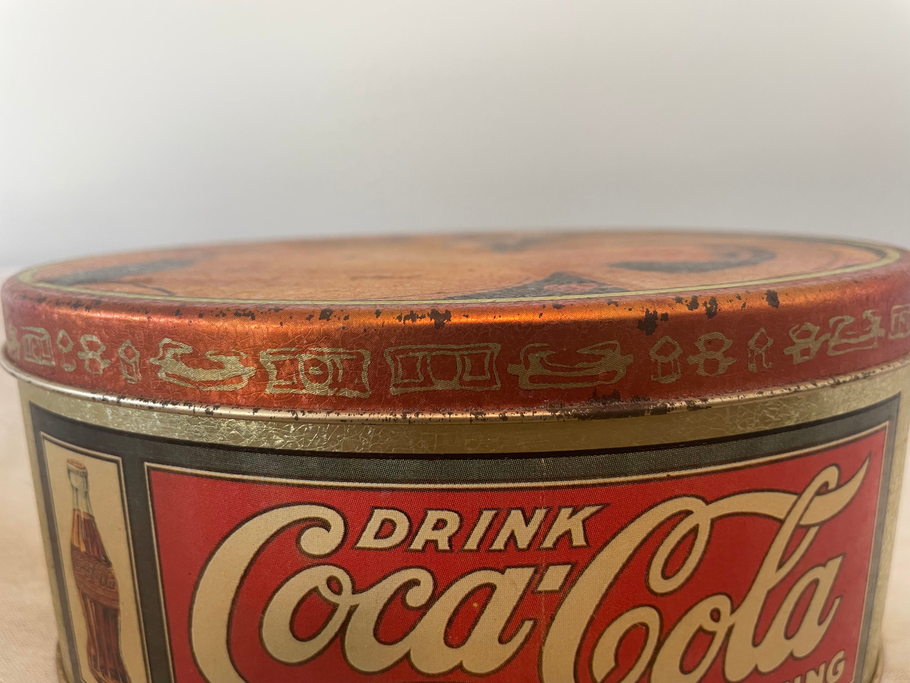 Mid 1990’s Coca-Cola oval gold tin