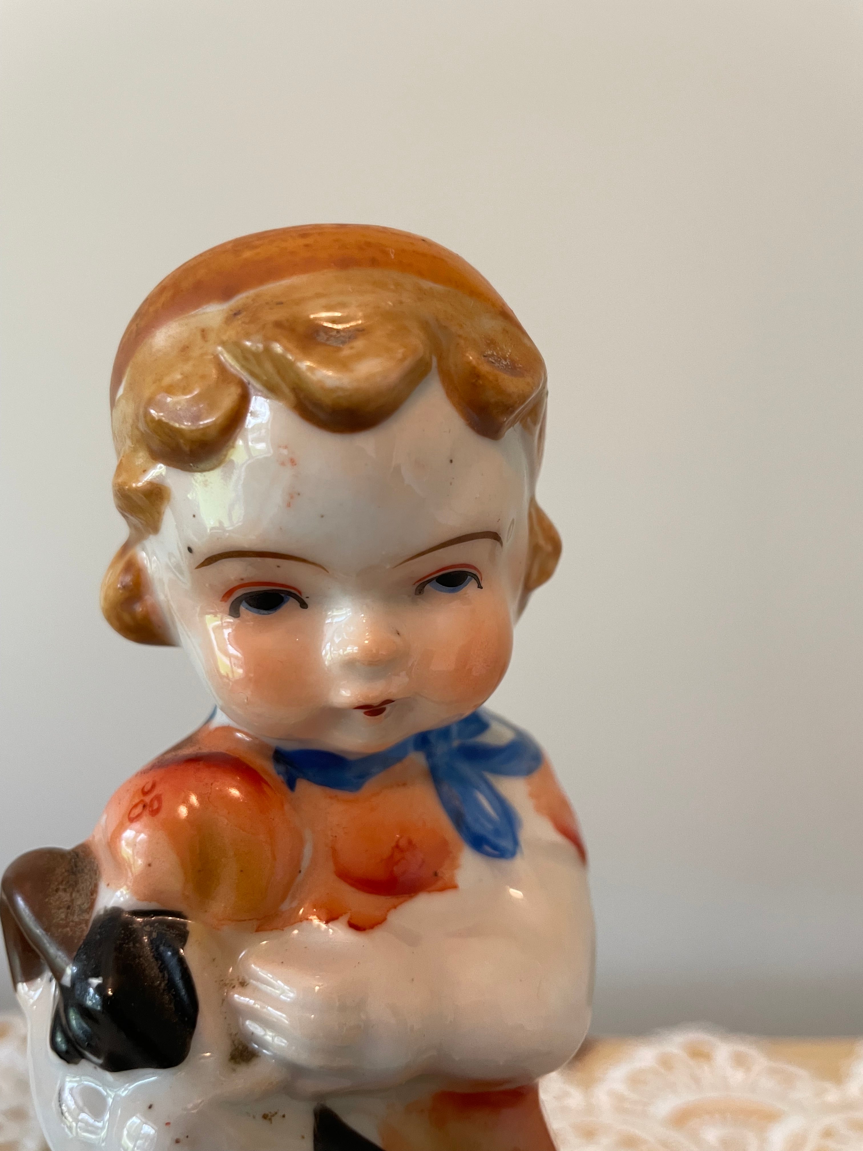 Vintage Japan hand painted boy and girl figurines