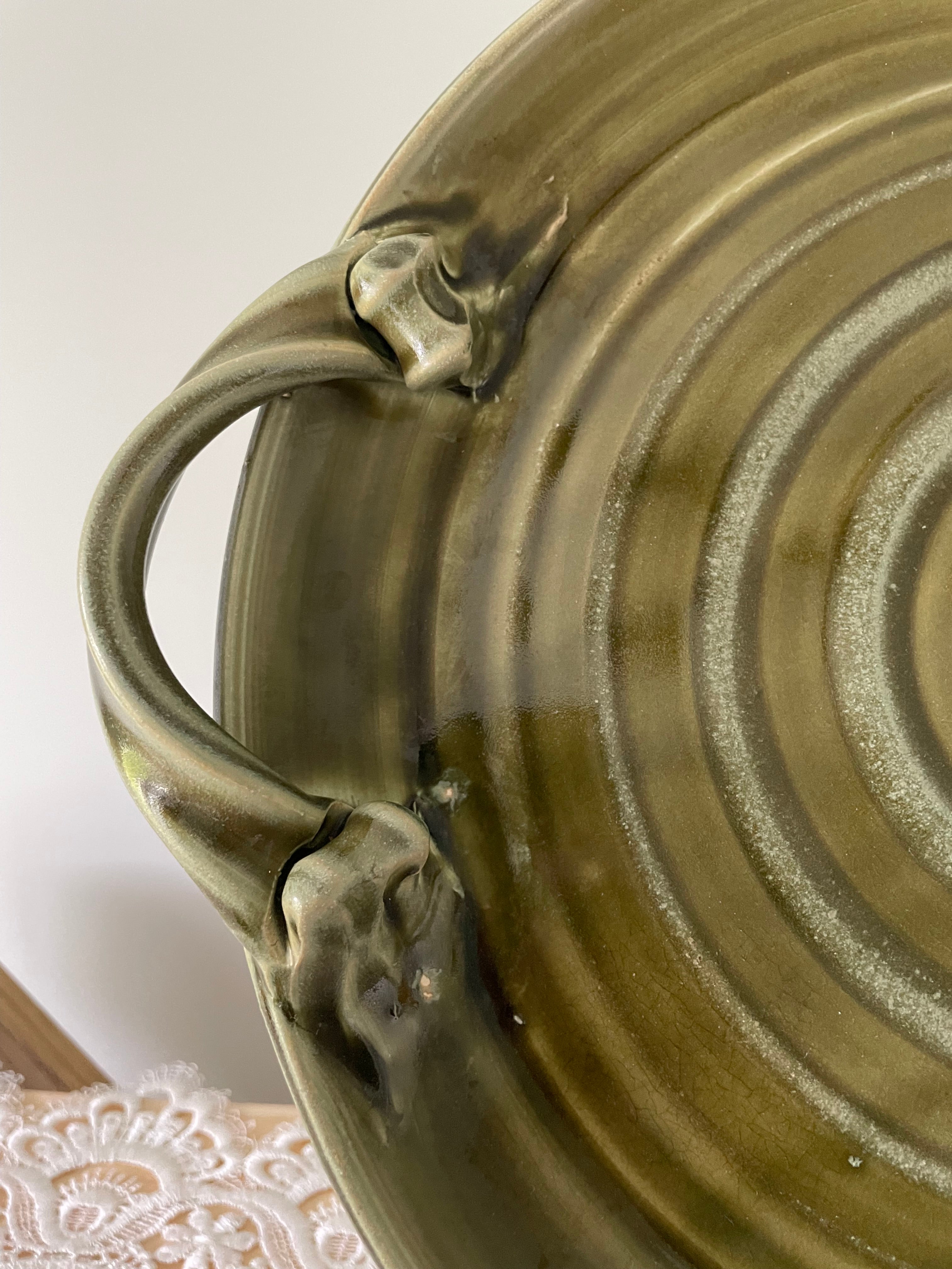 Olive green ceramic tray with sculpted handles
