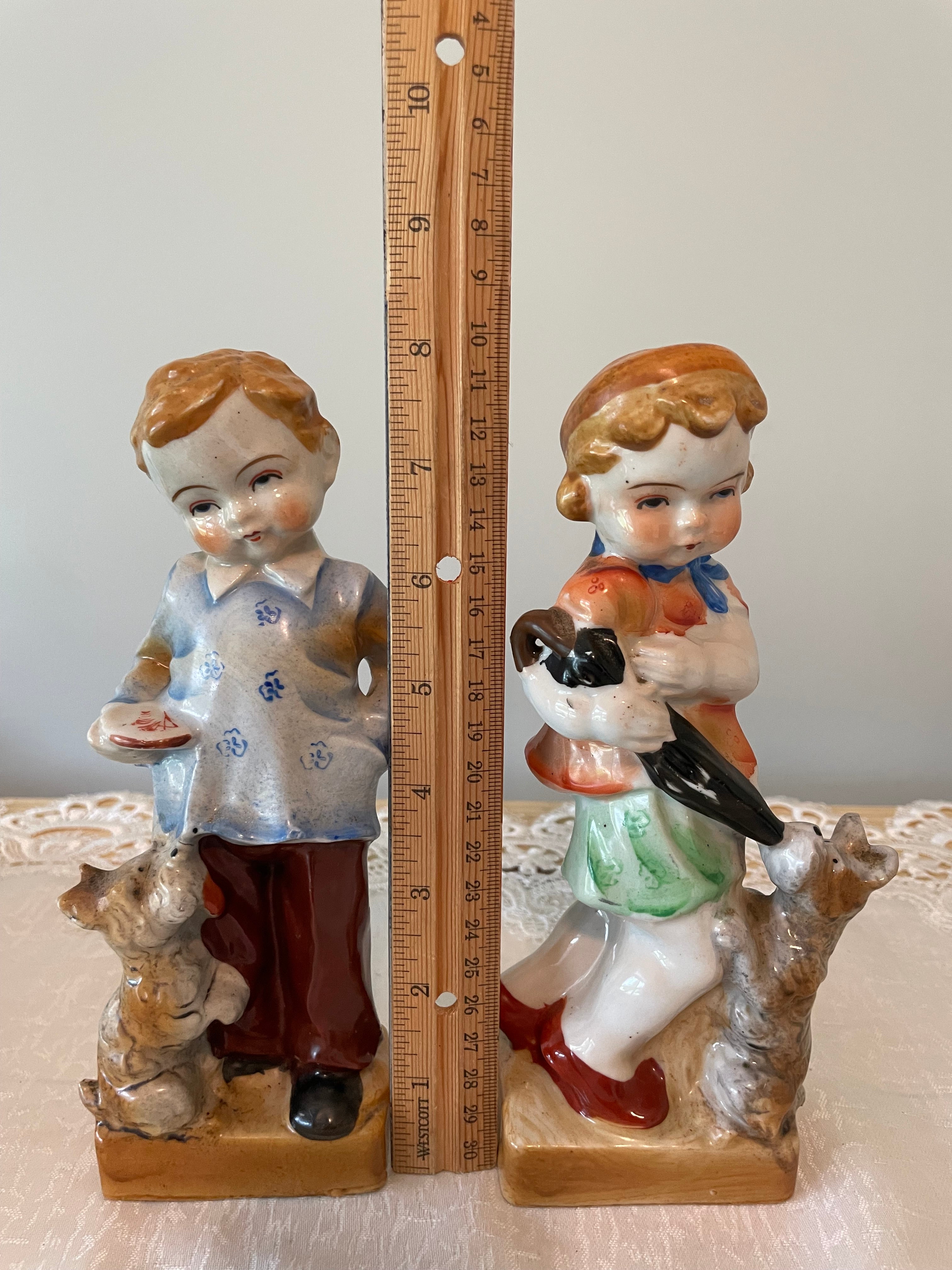 Vintage Japan hand painted boy and girl figurines