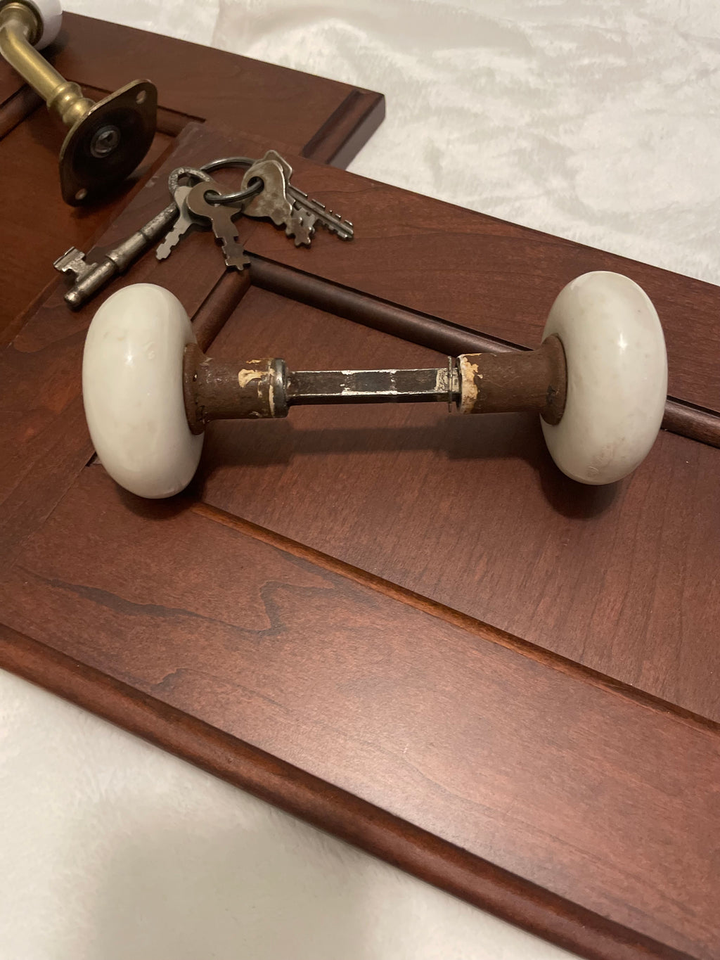 Victorian-era door knobs & wall hook