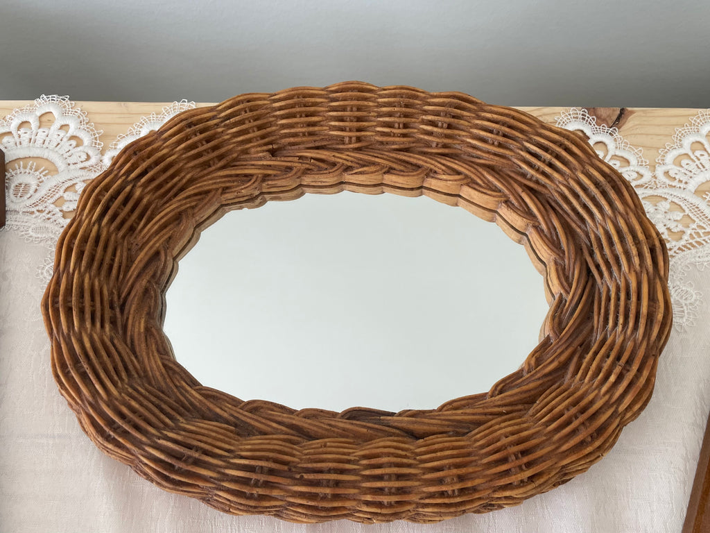 Vintage Rattan framed oval mirror