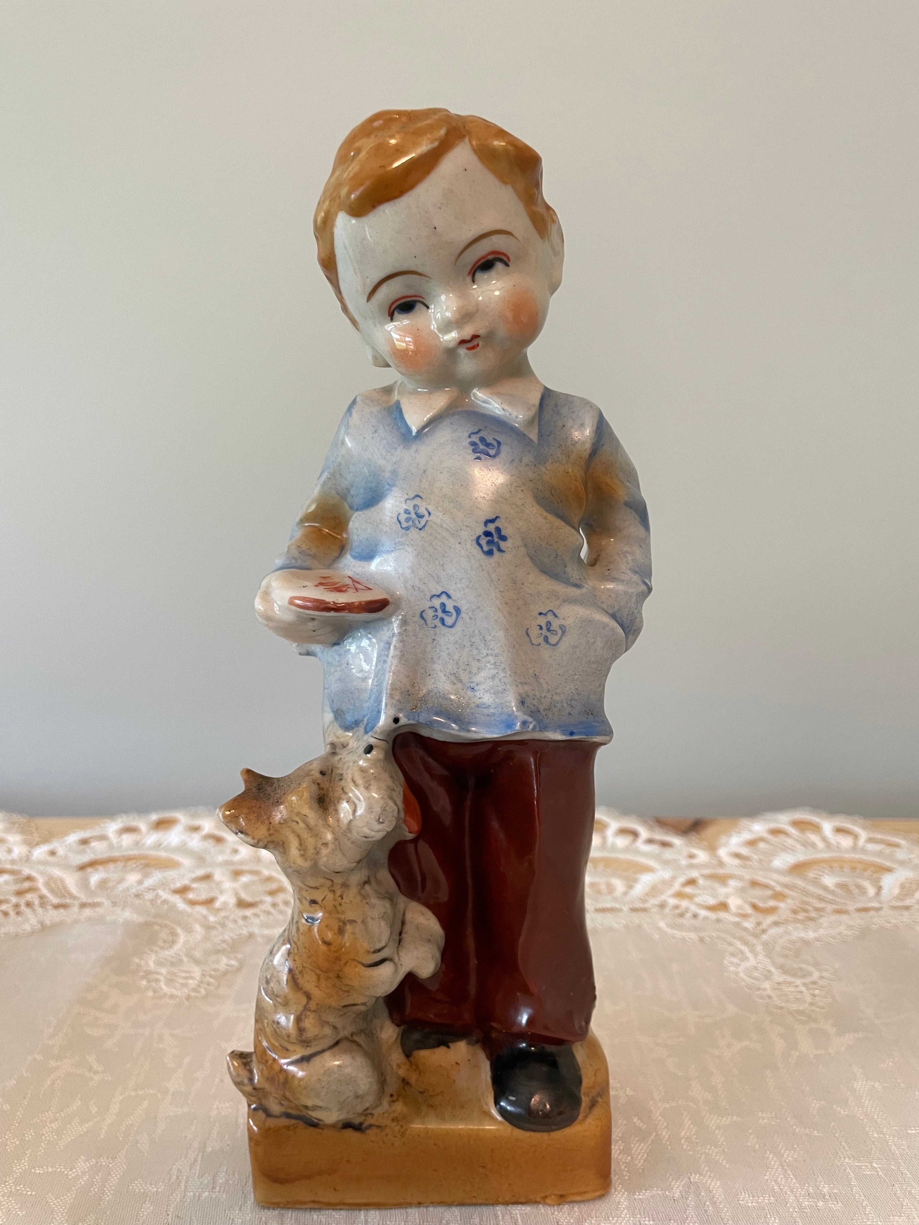 Vintage Japan hand painted boy and girl figurines