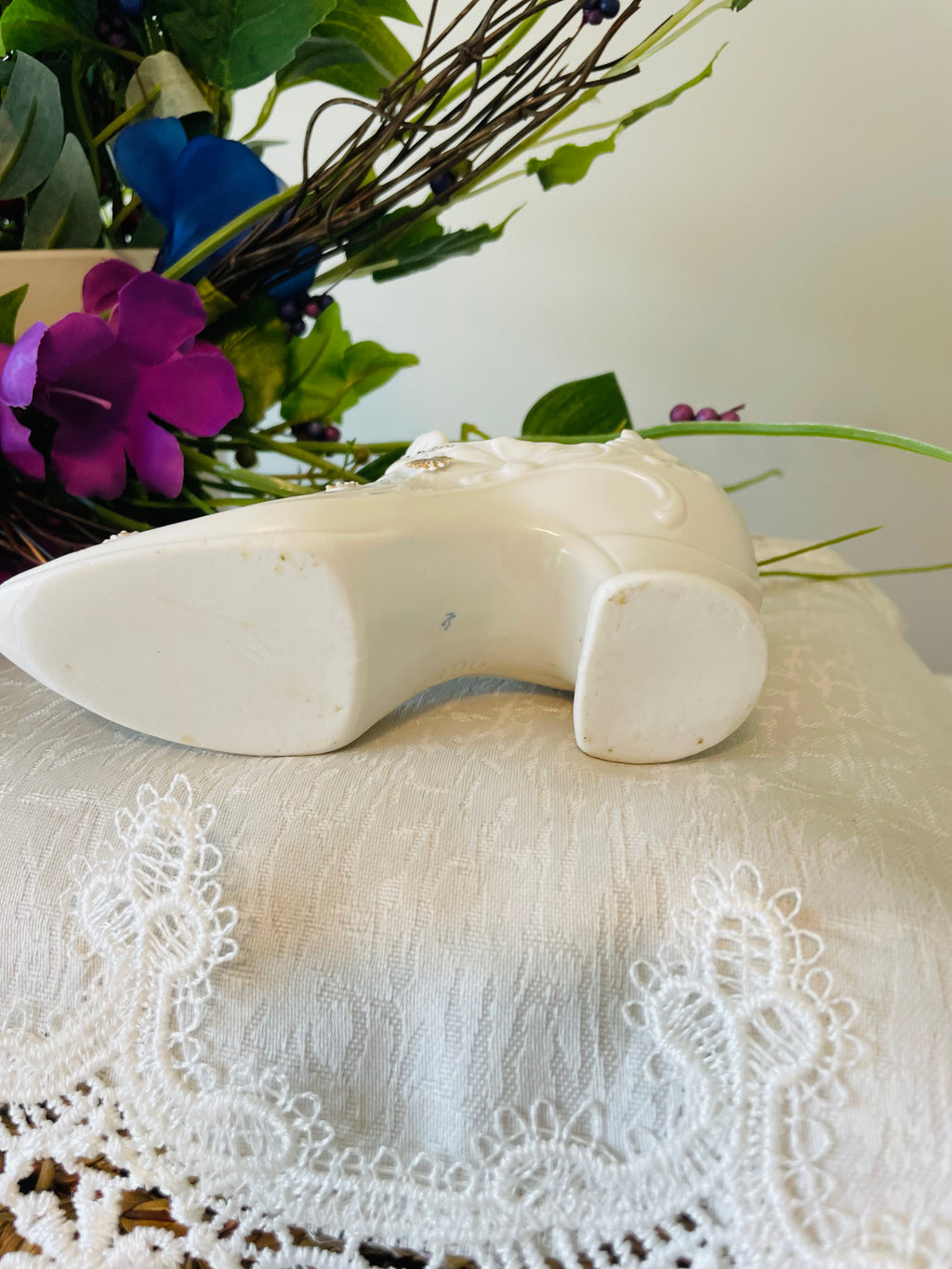 Victorian porcelain shoe with embossed floral and gilded accents